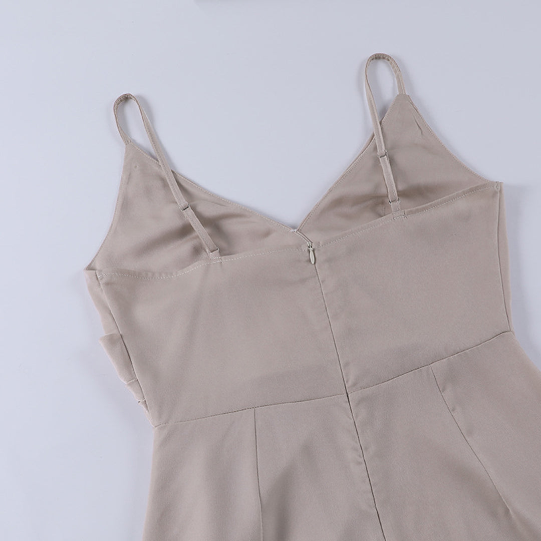 Long slip dress with side slit by Montaracrest, featuring a flowing fabric and elegant design suitable for formal or casual occasions.