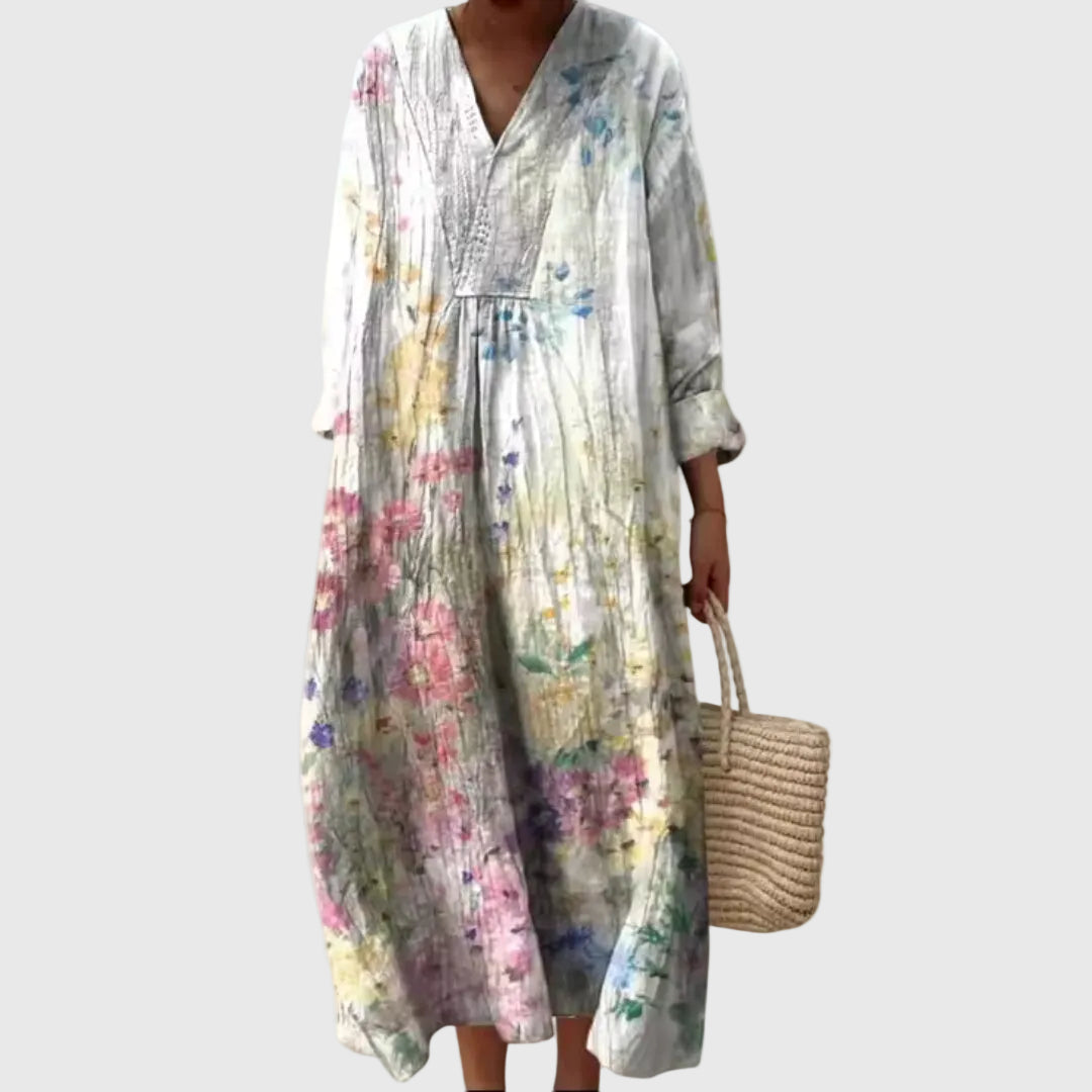 Montaracrest Stephanie midi geometric dress displayed on a hanger, showcasing its stylish pattern and elegant length.