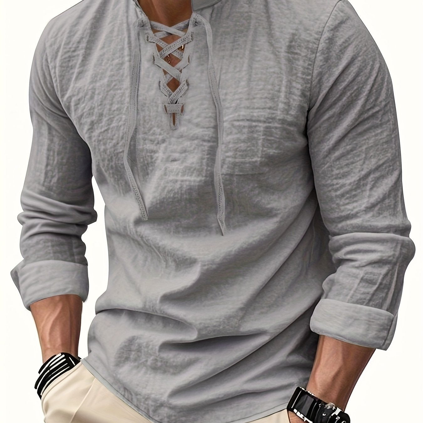 Montara & Crest V-neck shirt displayed on a hanger, featuring a soft fabric and classic fit in a neutral color.