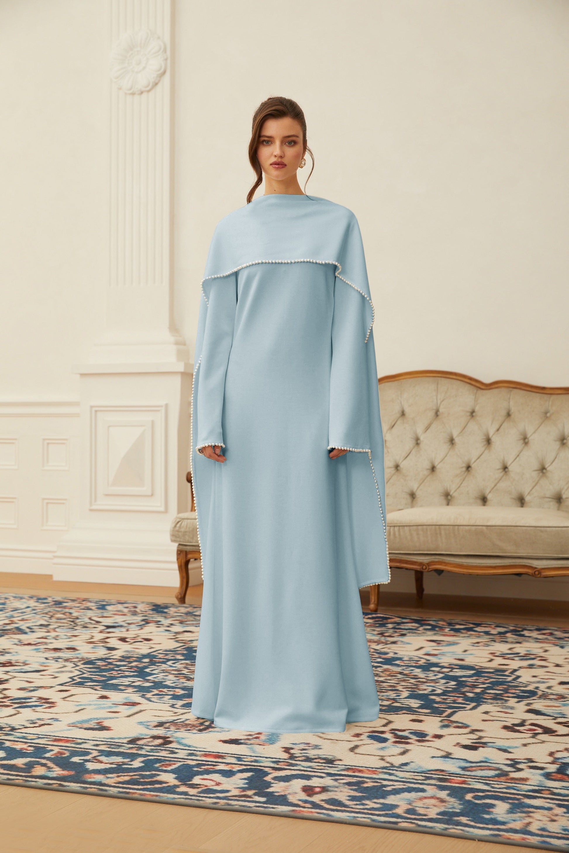 Montaracrest Piroska Blue Pearl Trim Shawl Detail Maxi Dress with elegant flowing fabric and intricate pearl-embellished shawl detail.