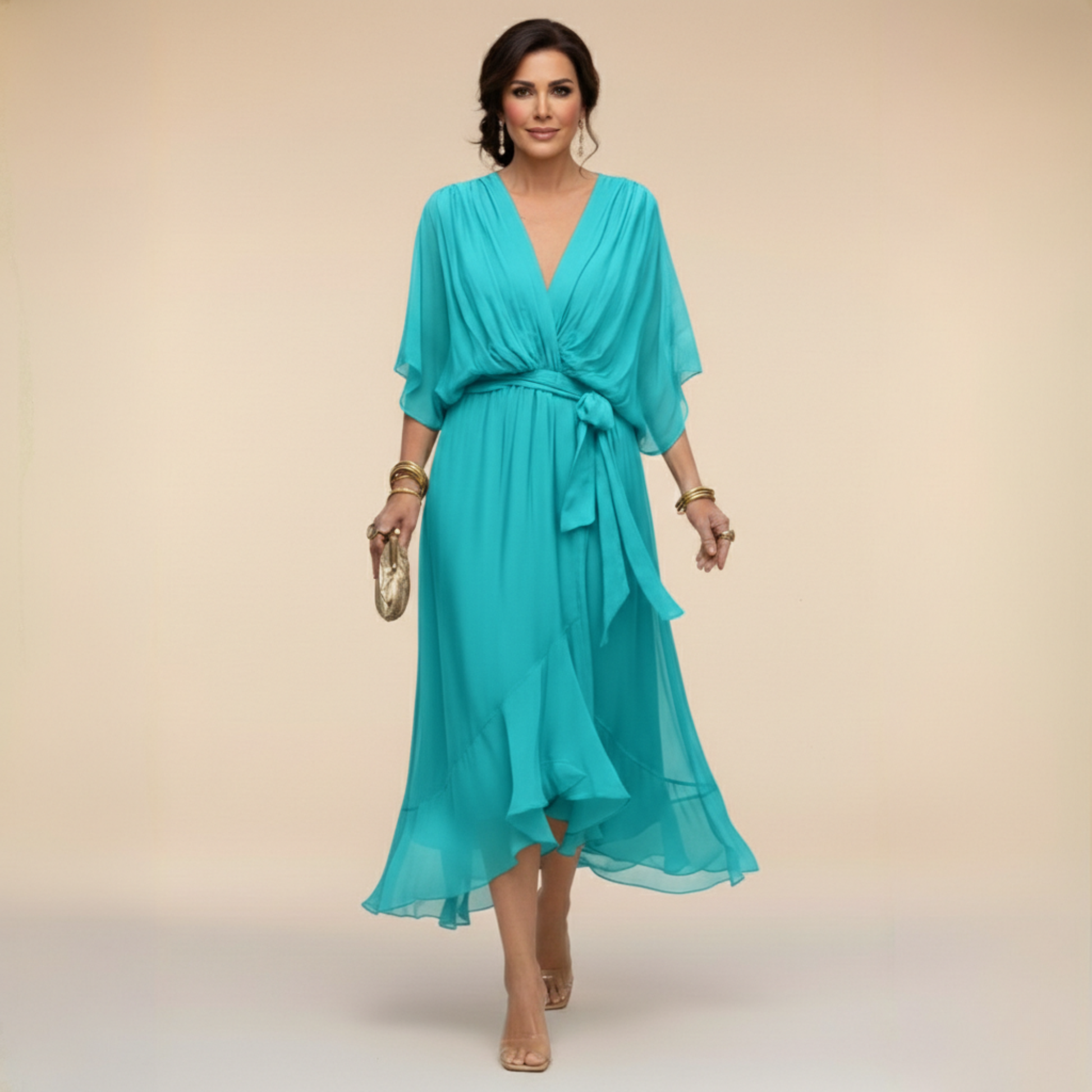 Montaracrest Monica chiffon dress with a V-neckline, flowing fabric, and an elegant sleeveless design—perfect for stylish summer wear.