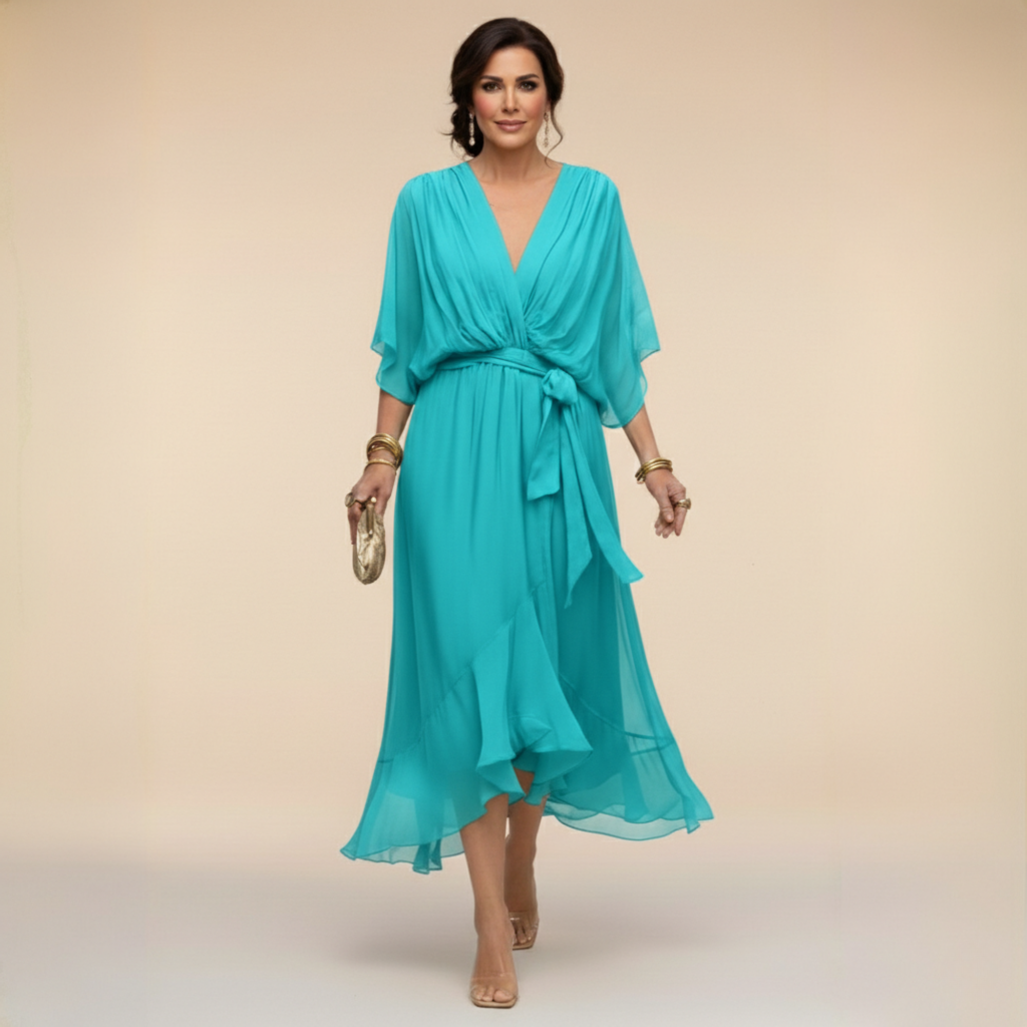 Montaracrest Monica chiffon dress with V-neckline, flowing fabric, and elegant sleeveless design for stylish summer wear.
