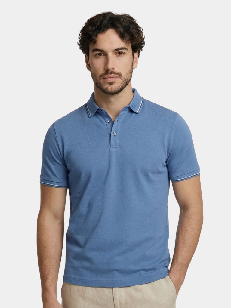 Montaracrest Polo Classica Azure in light blue with collar and buttons, showcasing a classic men's polo shirt.