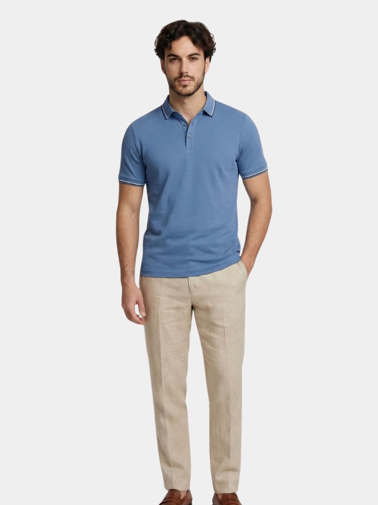Montaracrest Polo Classica Azure in sky blue, classic polo shirt with a collar and short sleeves, displayed flat on a white background.