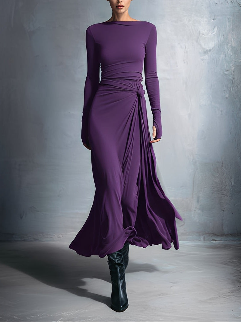 Vittoria maxi dress with side knot detail from Montaracrest, featuring a flowing fabric and elegant design.