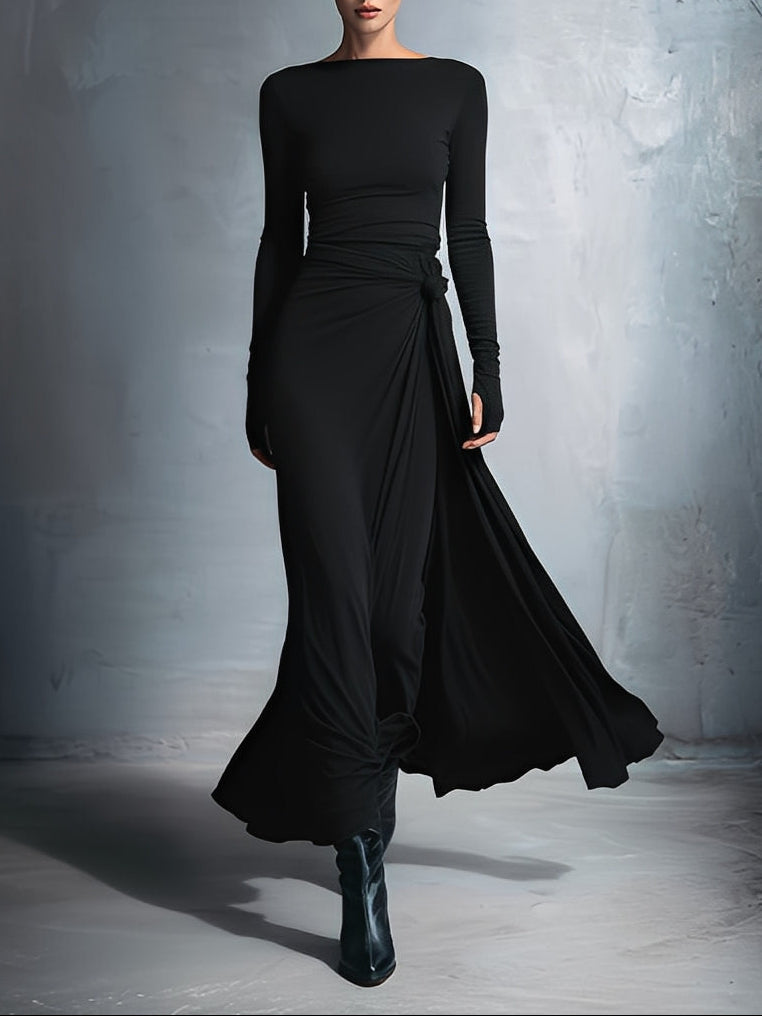 Montaracrest Vittoria maxi dress with side knot, flowing fabric, and elegant design perfect for casual or formal occasions.