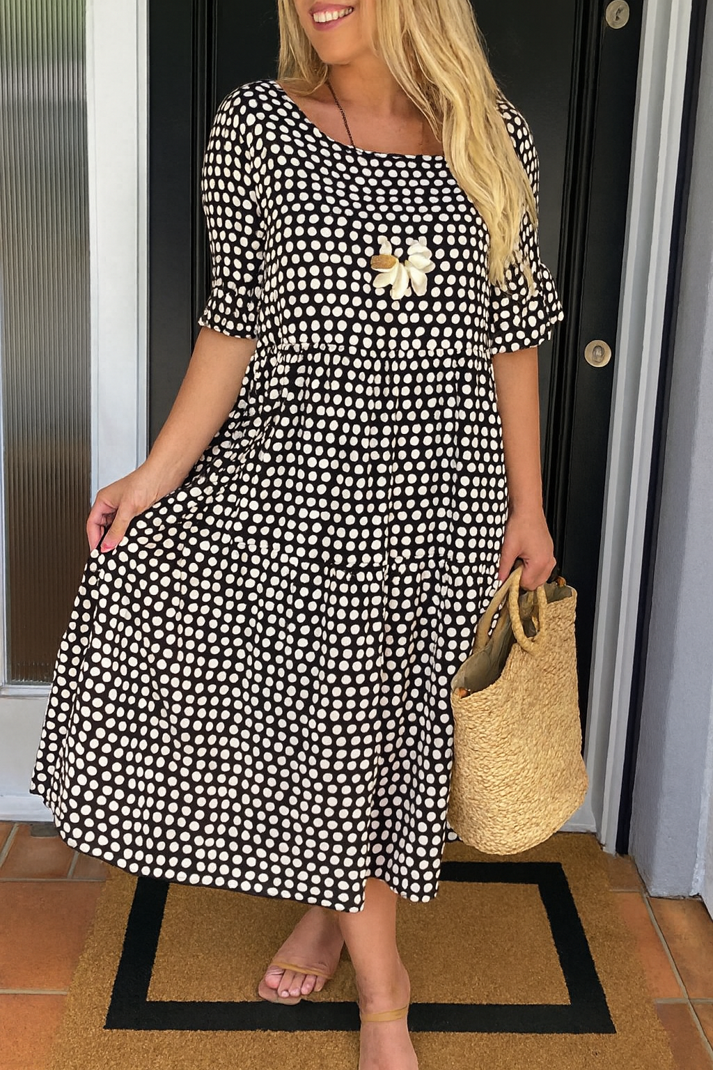 Montaracrest Iris midi dress with short sleeves in sandy color featuring a subtle polka dot pattern.
