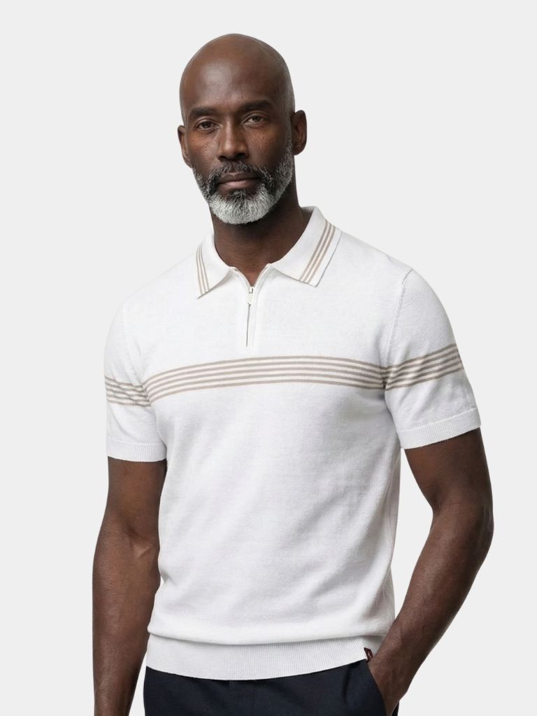 Ivory Polo shirt by Montaracrest, featuring a classic polo collar and short sleeves, displayed on a hanger.