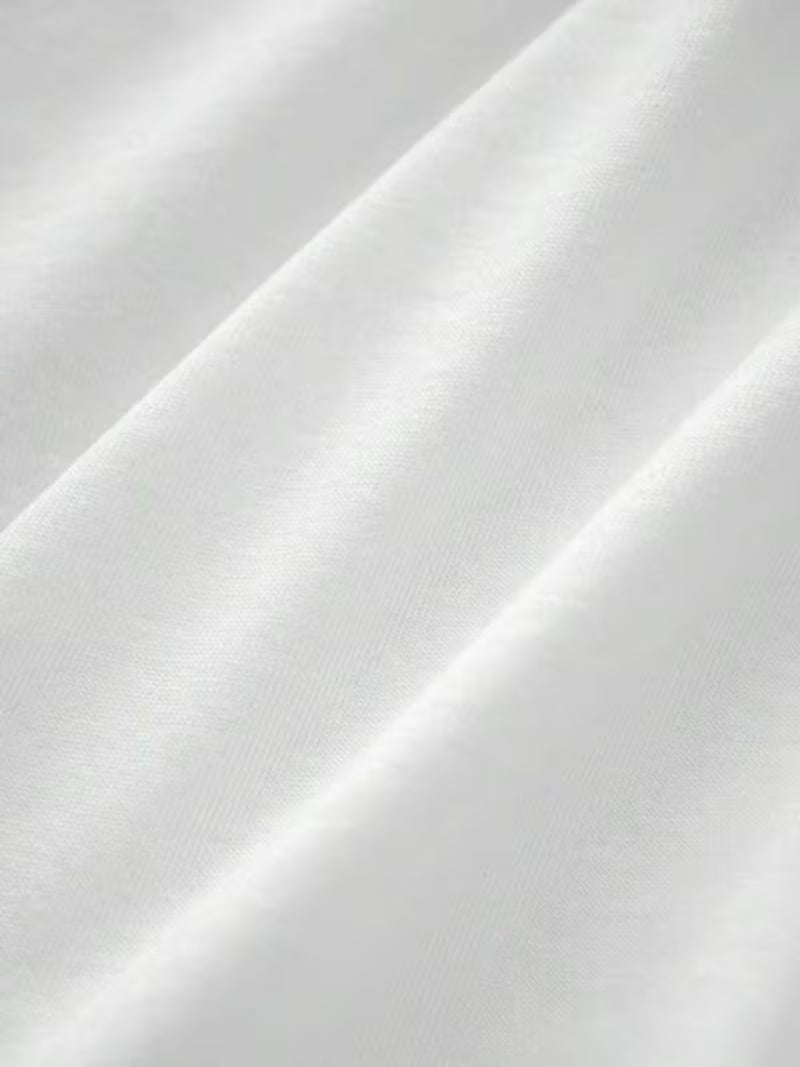 Cresta cotton cot cover with a colorful printed design by Montara & Crest, featuring soft fabric and a vibrant pattern.