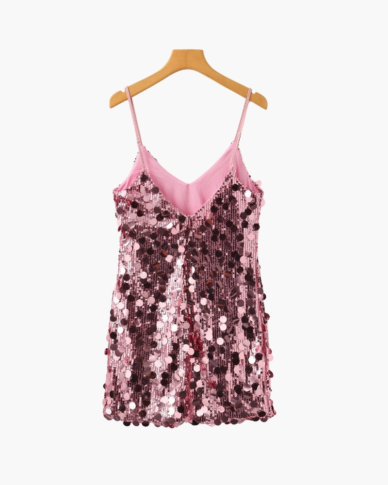 Shimmery mini party dress with sequins from Montaracrest, featuring a fitted silhouette and sparkling embellishments.