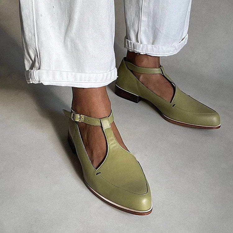 Elegant black Scarpa T-Bar from Montaracrest featuring a sleek design and stylish T-shaped strap.