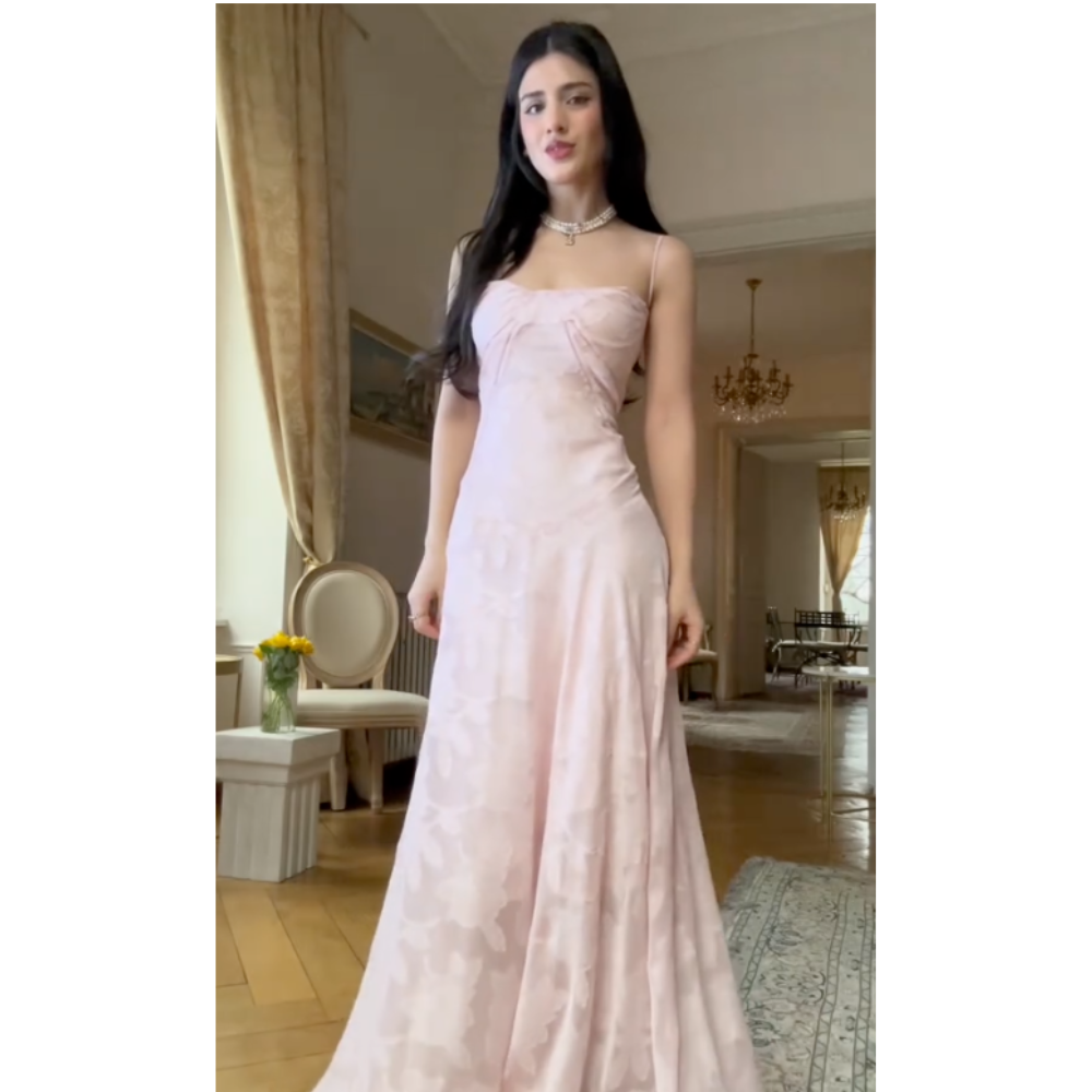 Elegant long dress by Montaracrest featuring a sophisticated design, ideal for special occasions and formal events.