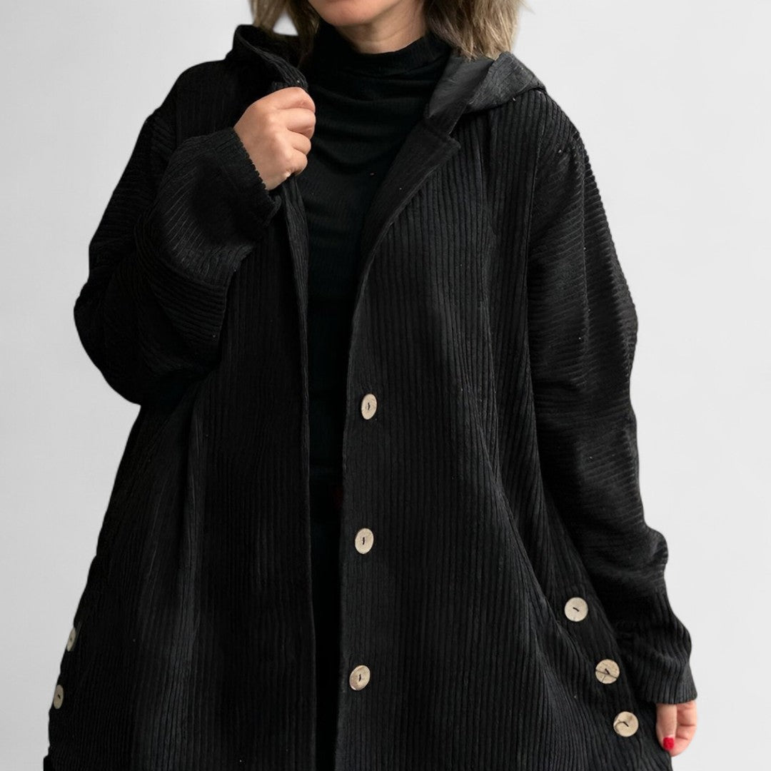 Montaracrest Cordia velvet hoodie jacket with ribbed texture, hood, and stylish design, shown on a model.