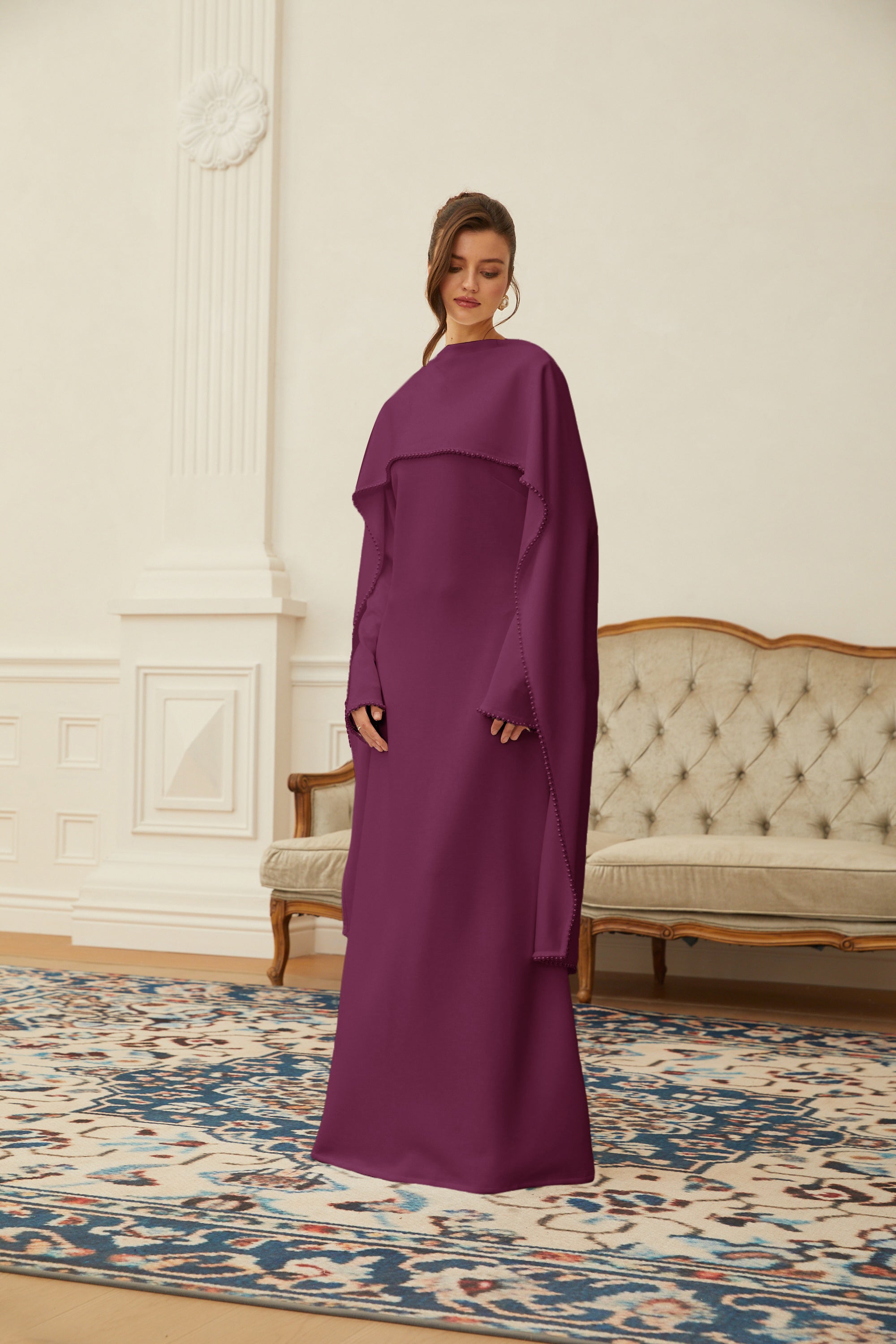 Montaracrest Piroska Purple Pearl Trim Maxi Dress featuring elegant purple fabric with pearl-embellished shawl detail.