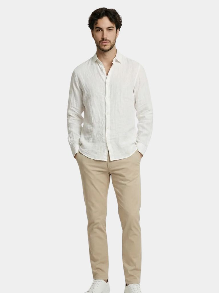 Light beige linen summer shirt by Montaracrest with a relaxed fit and classic collar, showcased on a hanger.