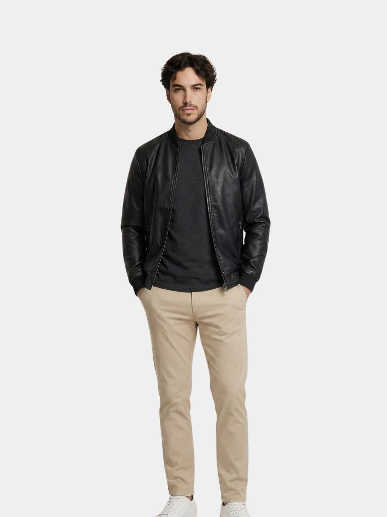 Montaracrest essential leather jacket, stylish black men's jas with classic collar and zip closure, close-up view of front details.