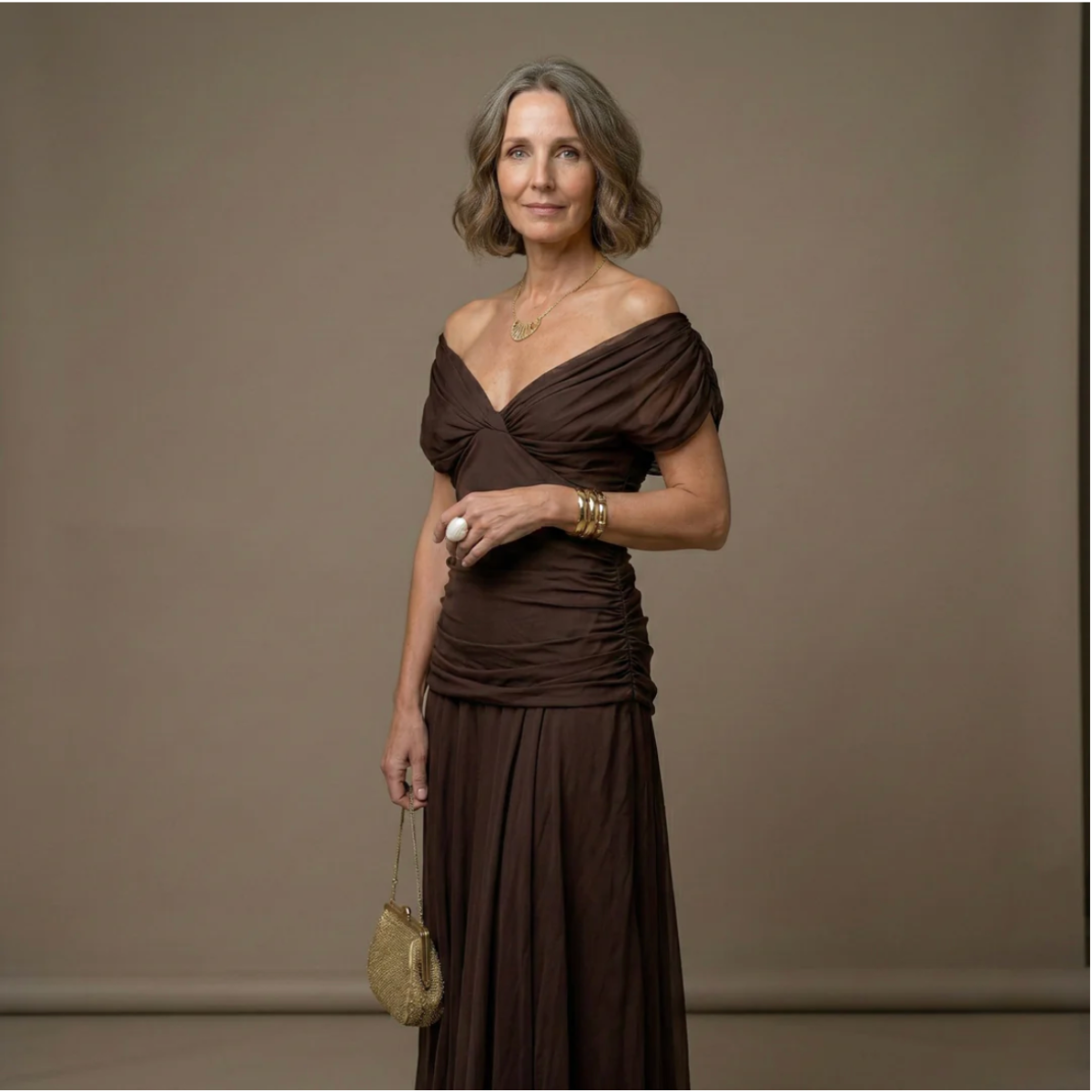 Elegant Montaracrest Luisa long dress with V-neckline, highlighting a flattering silhouette and sophisticated style.