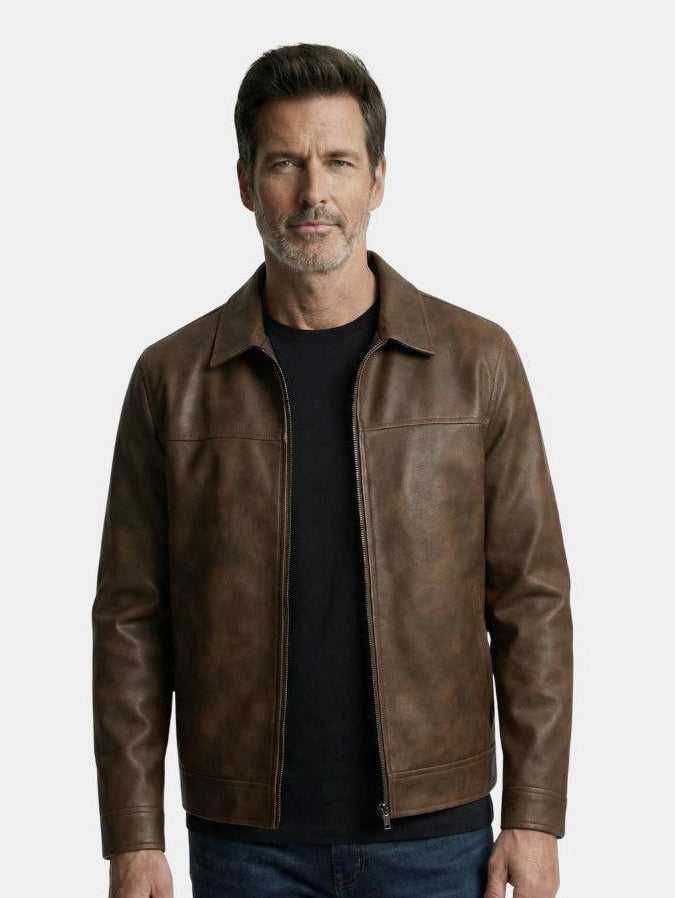 Black leather jacket from Montaracrest, Regent Estate, featuring a stylish design with zipper details and a fitted silhouette.