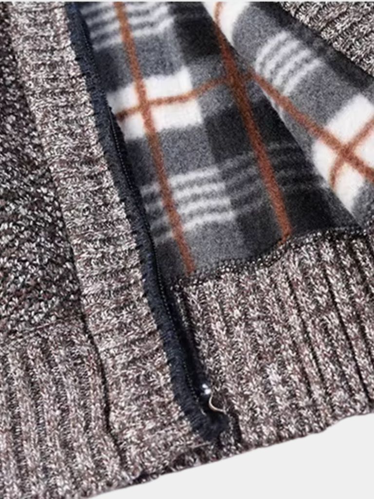 Montaracrest knitted jacket with a textured weave, long sleeves, and a collar, showcasing intricate craftsmanship.