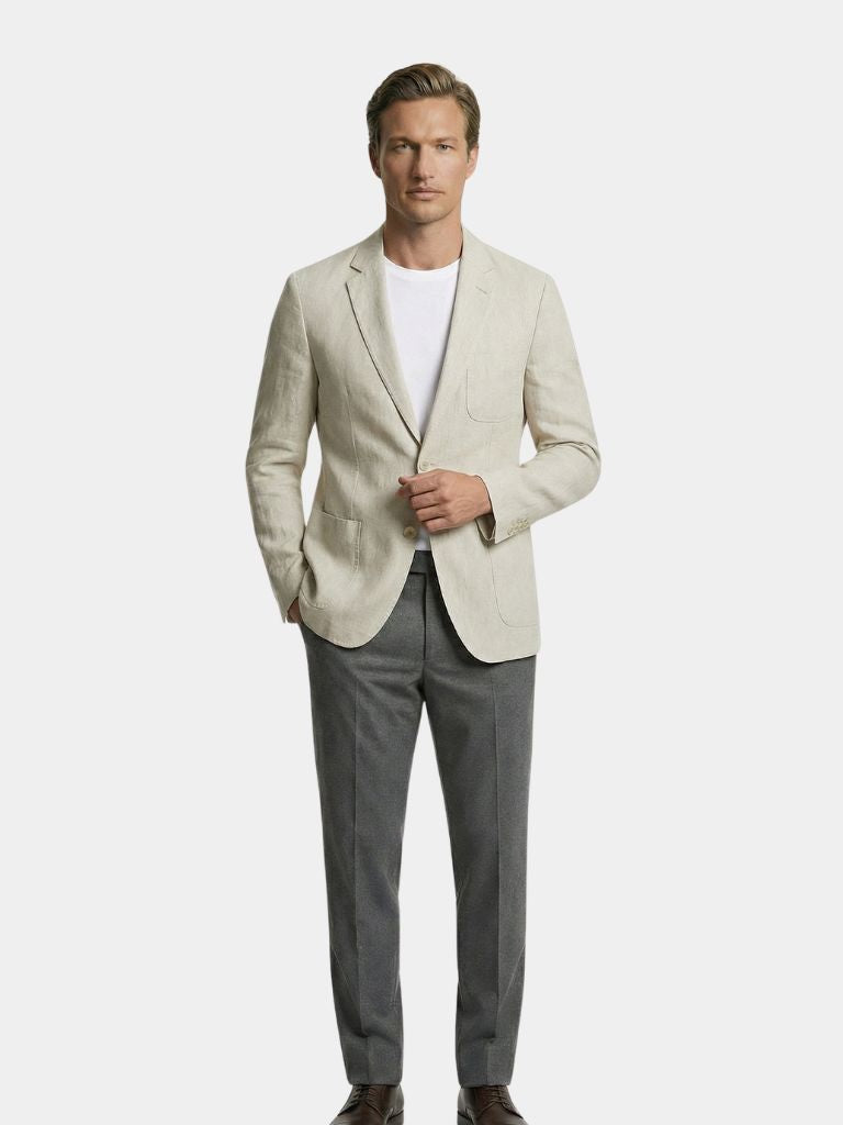 Montaracrest Gianni summer blazer in lightweight fabric, shown hanging on a wooden hanger against a neutral background.