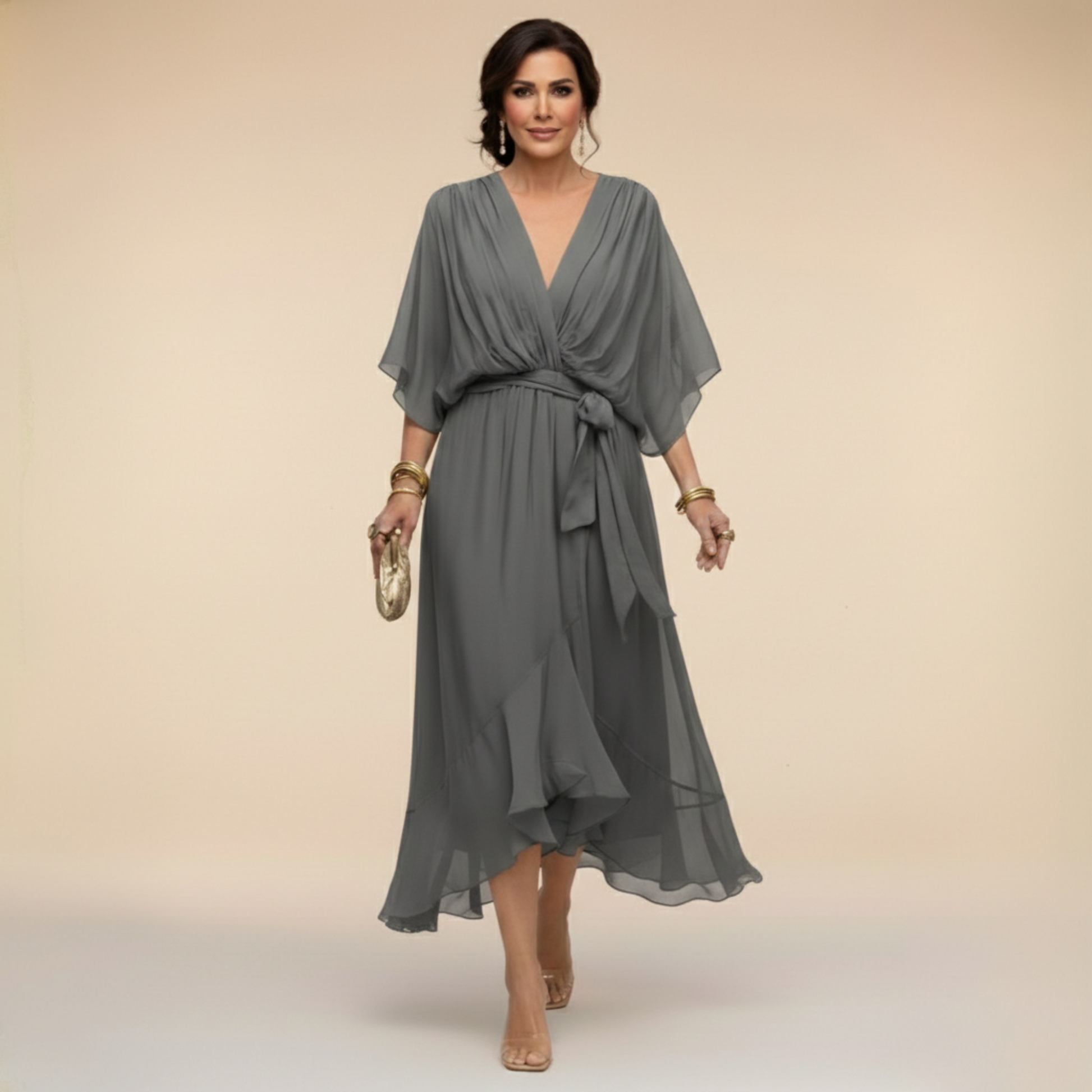 Montaracrest Monica chiffon dress featuring a V-neckline, flowing fabric, and elegant design, as shown in the product image.