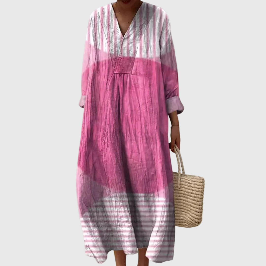 Montaracrest Stephanie midi geometric print dress displayed on a hanger, showcasing its stylish pattern and elegant design.