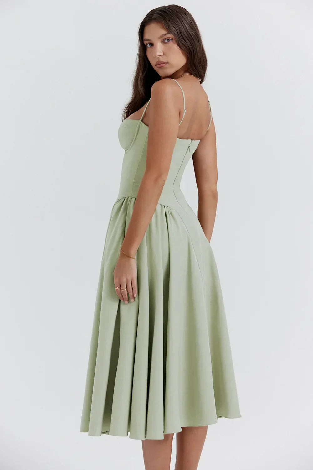 Montaracrest midi pleated dress with structured bodice and practical pockets, elegant and stylish for versatile wear.