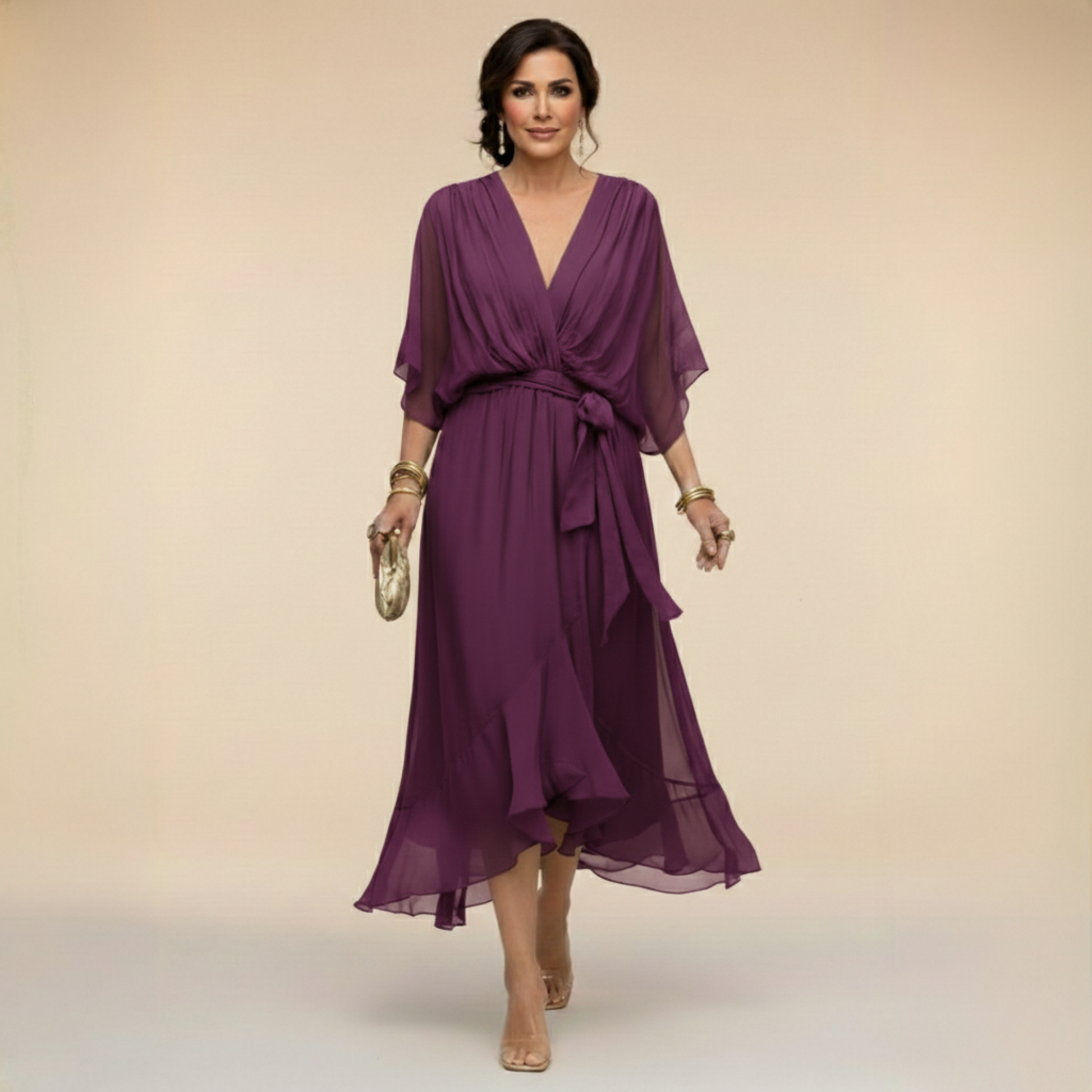Montaracrest Monica chiffon dress with a V-neckline, lightweight fabric, and an elegant sleeveless design, perfect for stylish occasions.