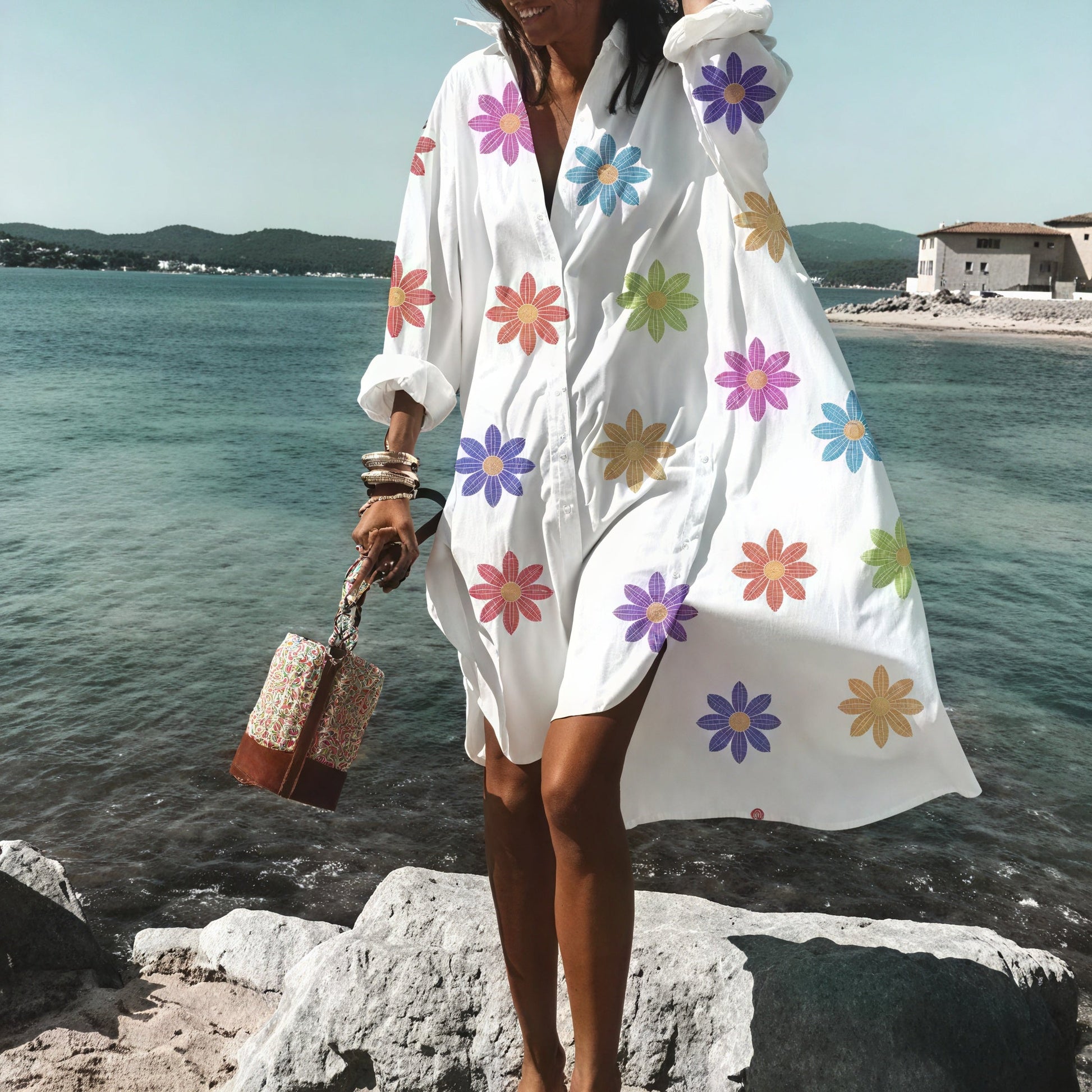 Light beige oversized summer dress with button details from Montaracrest, featuring a relaxed fit and casual style.