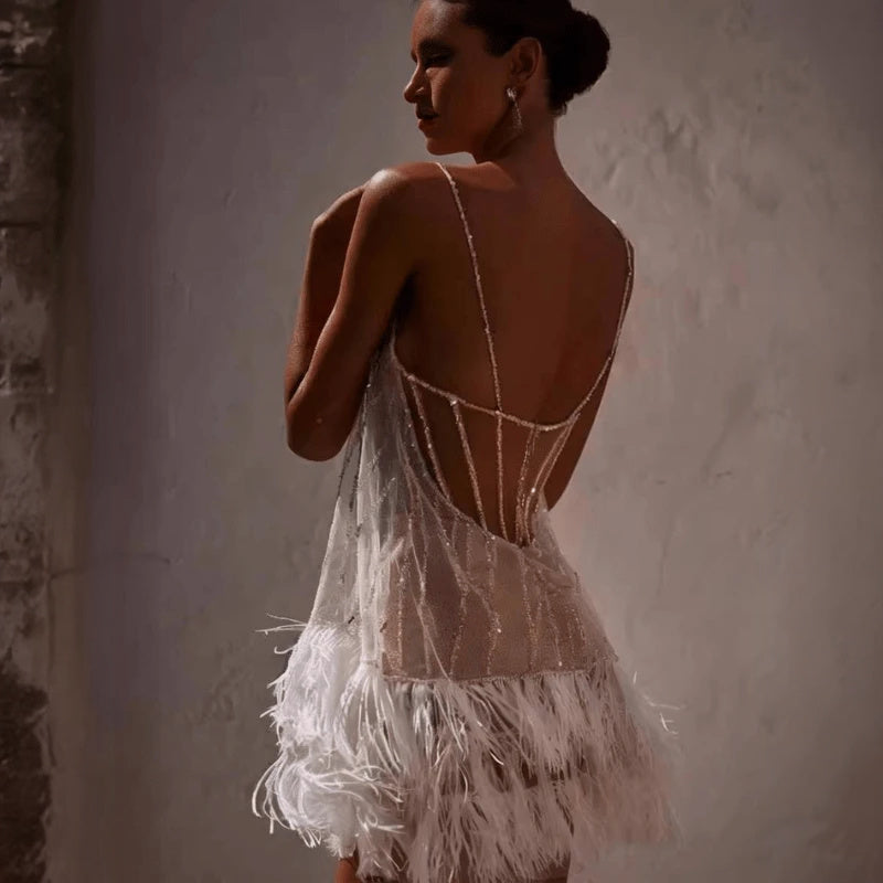 An elegant Montaracrest dress with unique detailing, featuring a fitted silhouette and stylish design, perfect for formal occasions.