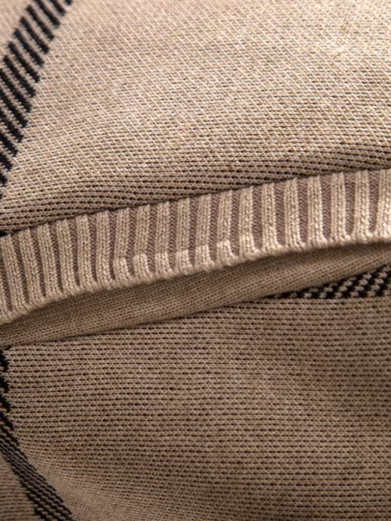 Montaracrest graphite knit jacket in a textured symmetry pattern, featuring a cozy fit and stylish design.