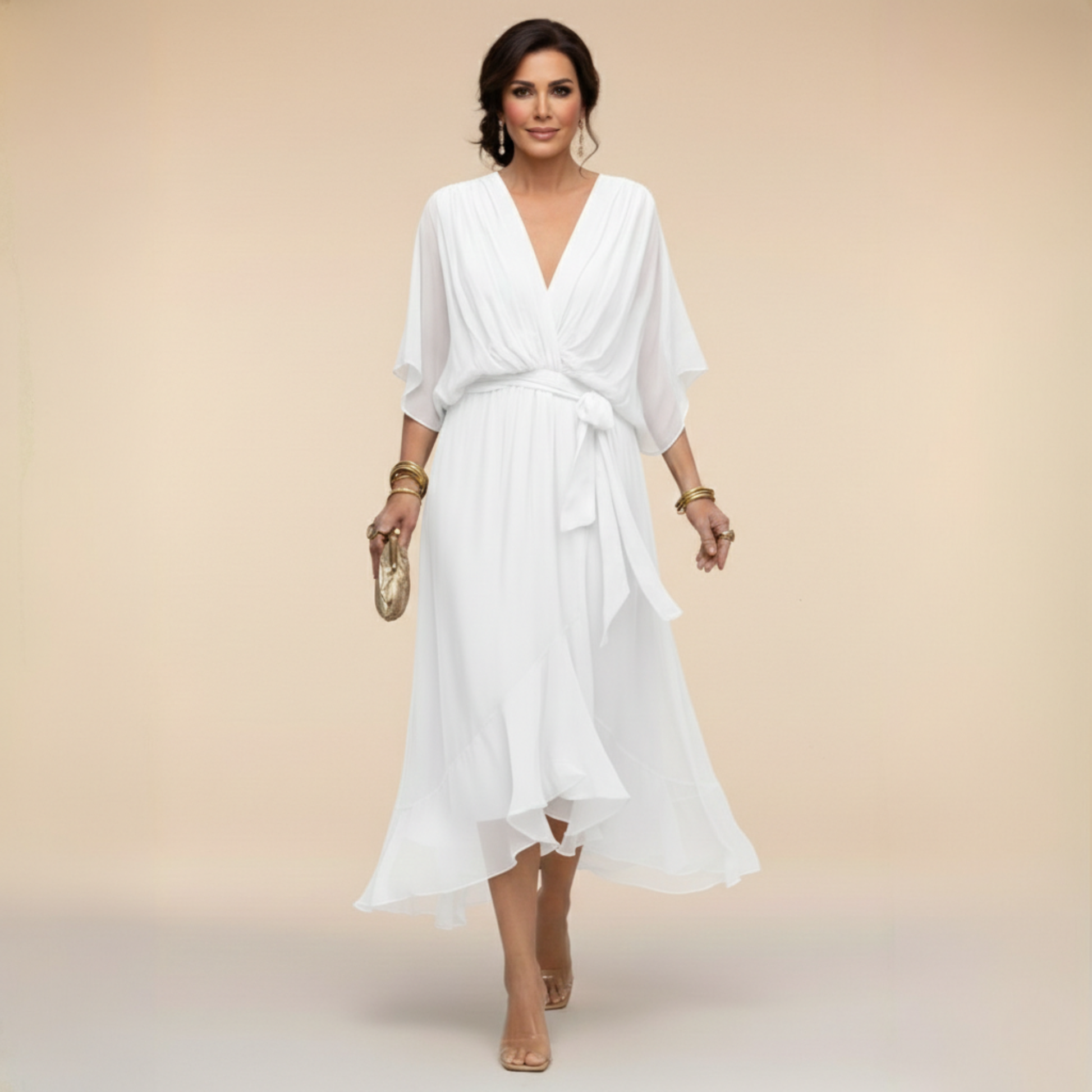 Montaracrest Monica chiffon dress featuring a V-neckline, flowing fabric, and an elegant sleeveless design.