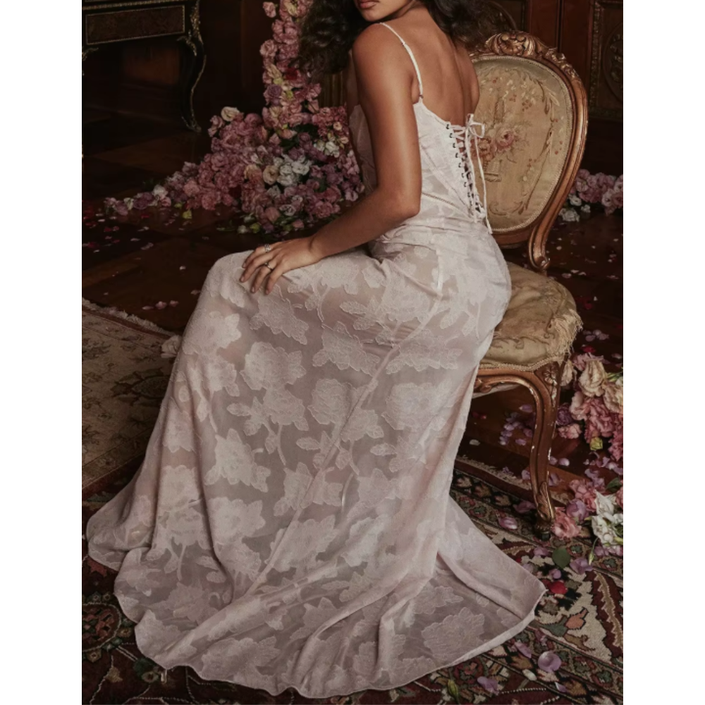 Elegant long evening dress by Montaracrest featuring a flowing silhouette and sophisticated design for special occasions.