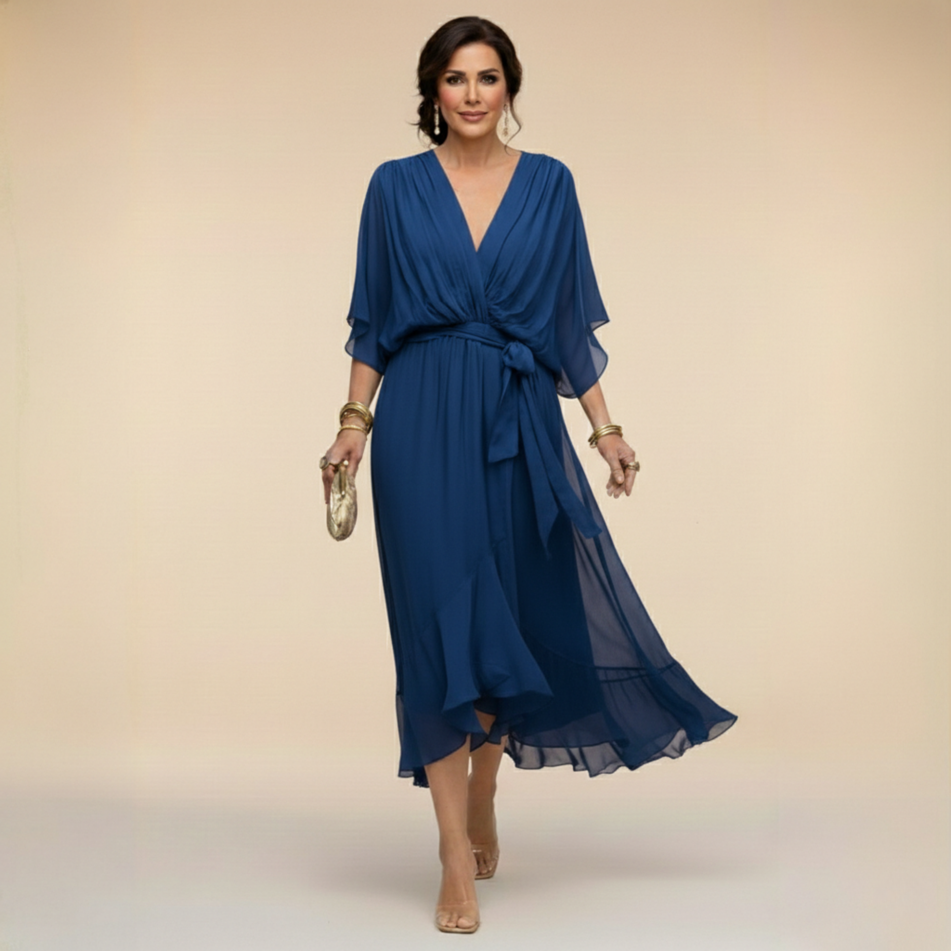 Montaracrest Monica chiffon dress with a V-neckline, flowing fabric, and elegant design, as modeled here.