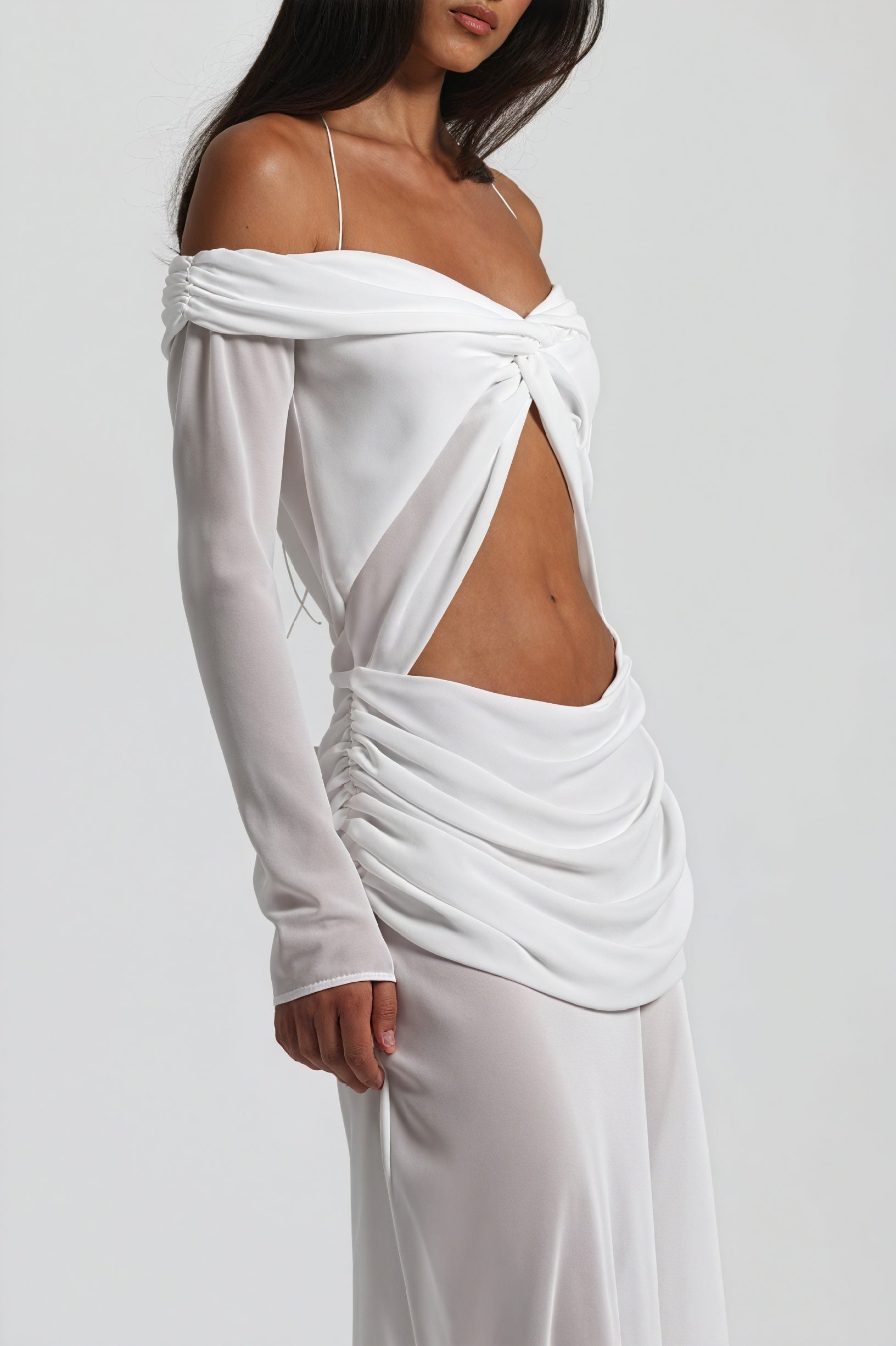 Montaracrest long dress with knot and cutout details, featuring a flowing silhouette and stylish design.