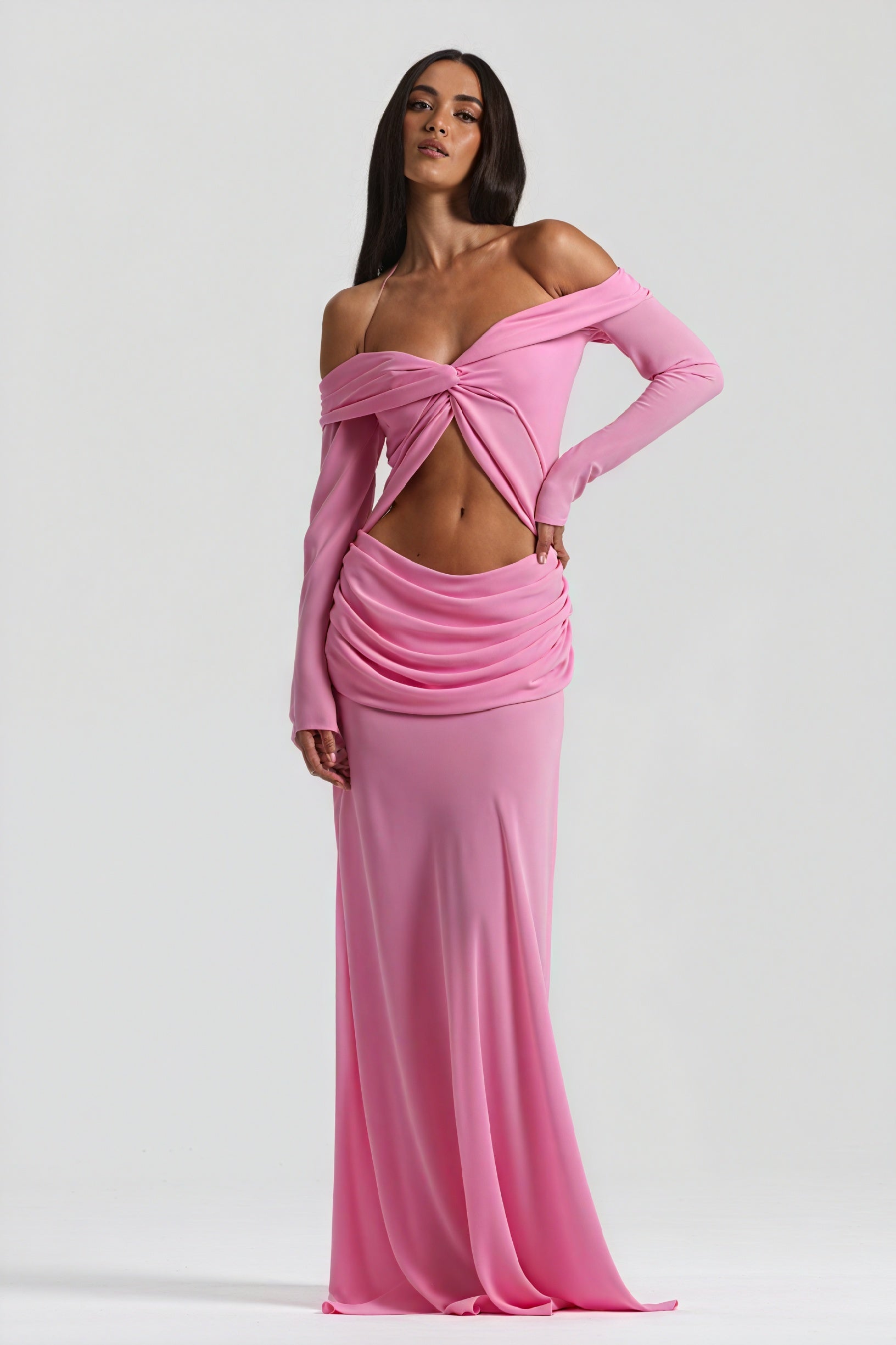 Long dress with knot and cutout details by Montaracrest, featuring a stylish design and elegant fit.