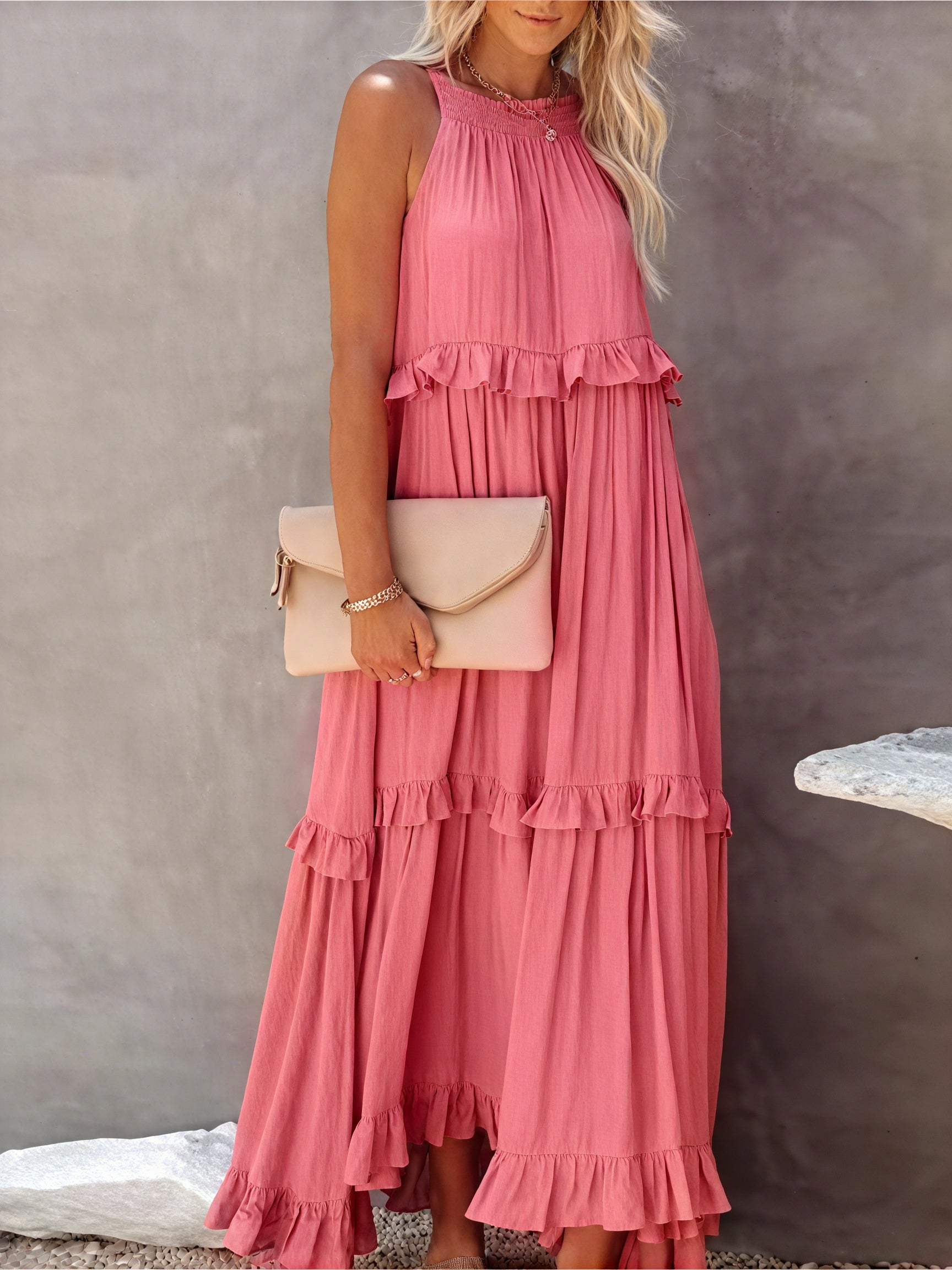 Fluid maxi dress with American-style neckline and ruffle details by Montaracrest, shown in a soft, flowing fabric.