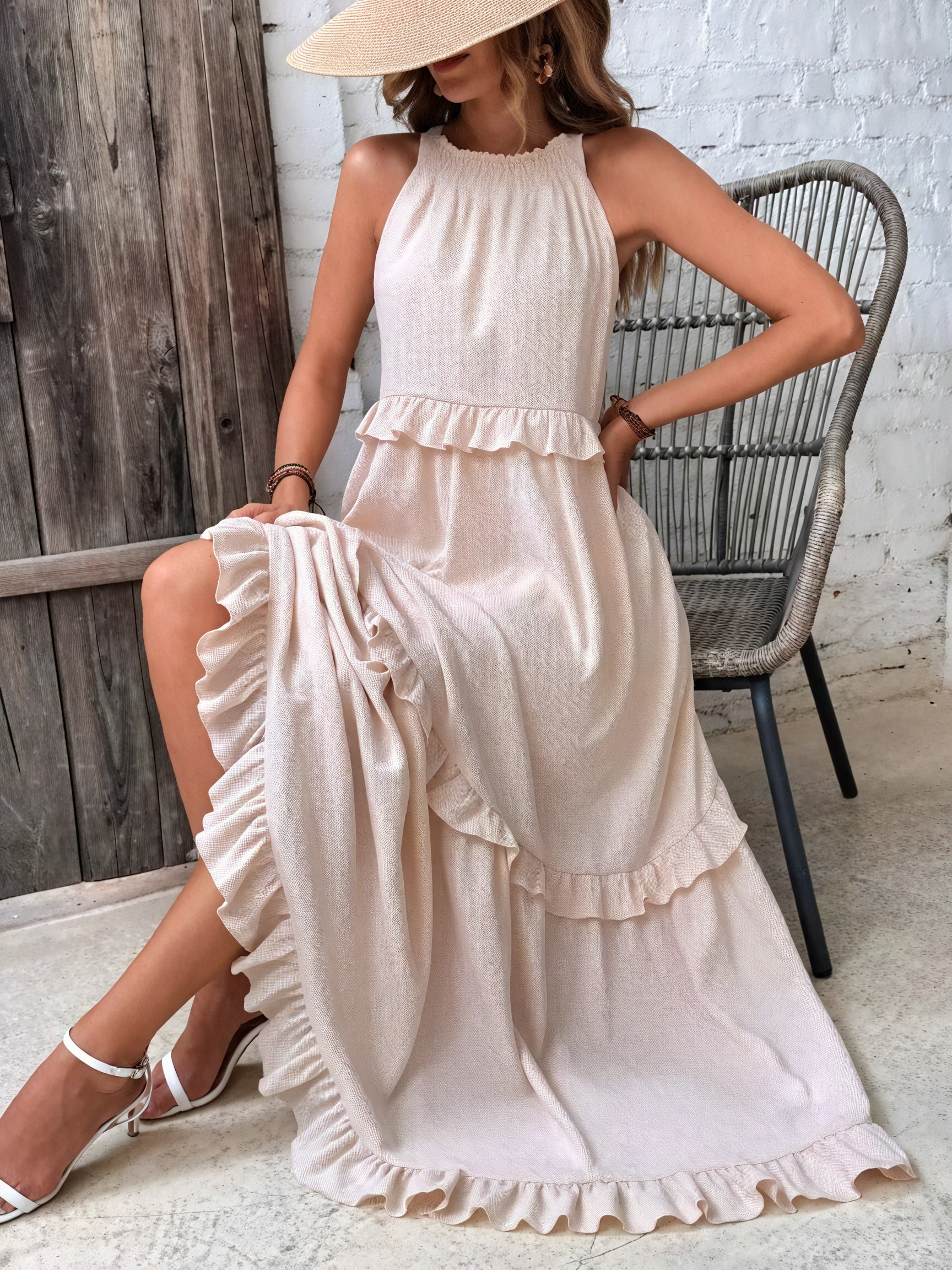 Maxi fluid dress with American-style neckline and frill details by Montaracrest, shown on a model.