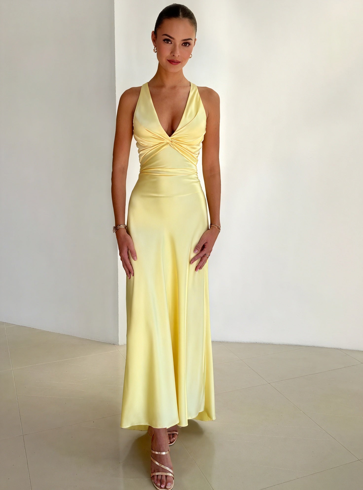 Elegant Montaracrest Eleganza Fluttuante dress with sculpted back, flowing fabric, and intricate design, perfect for formal occasions.