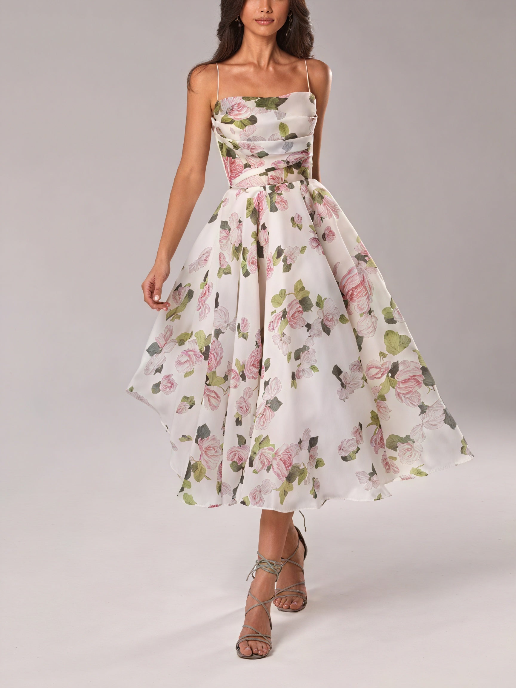Floral midi dress by Montaracrest featuring a flowing design and spring-inspired pattern, perfect for elegant spring occasions.
