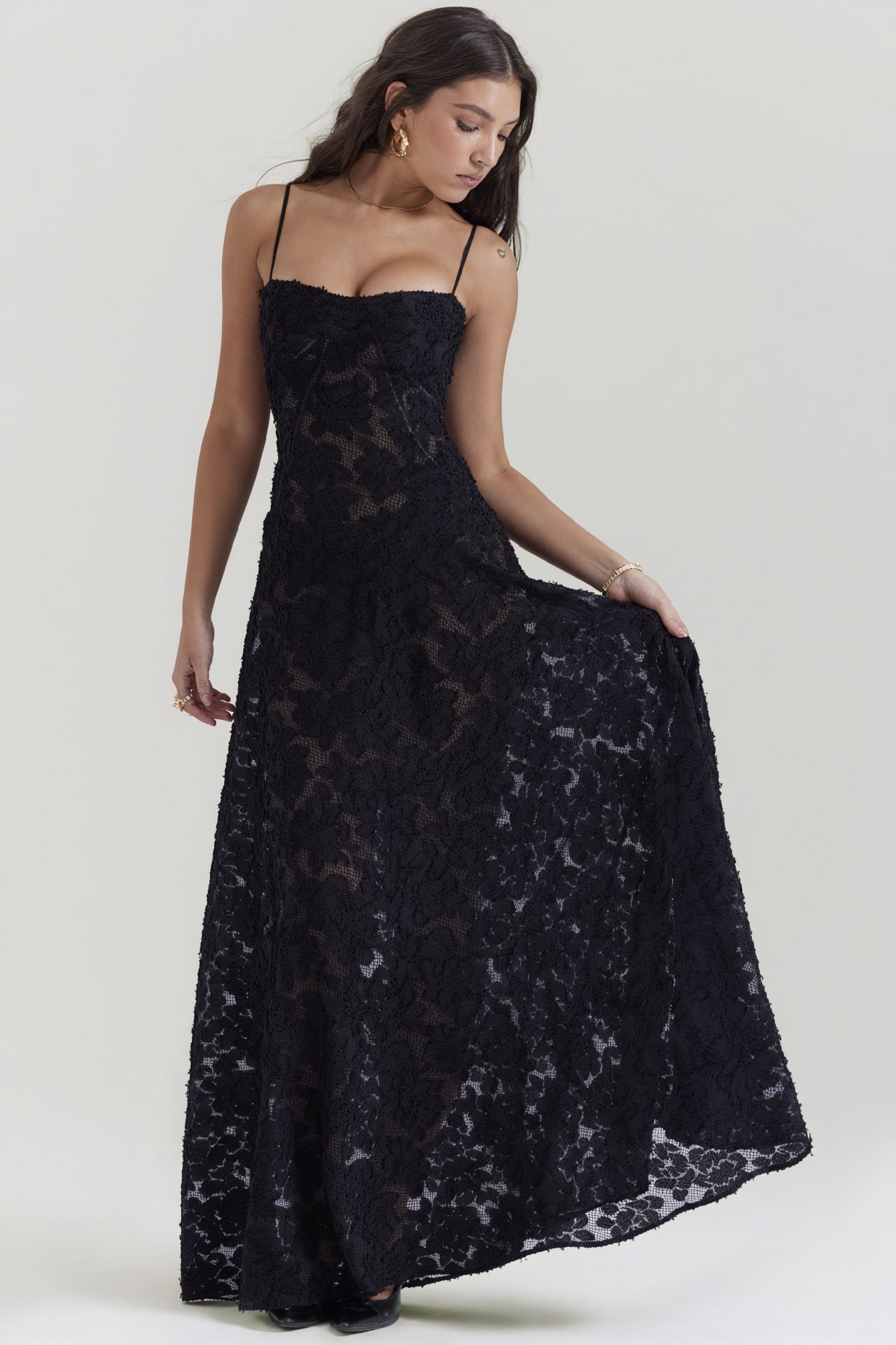 Elegant long dress by Montaracrest featuring a flowing silhouette, perfect for special occasions and formal events.