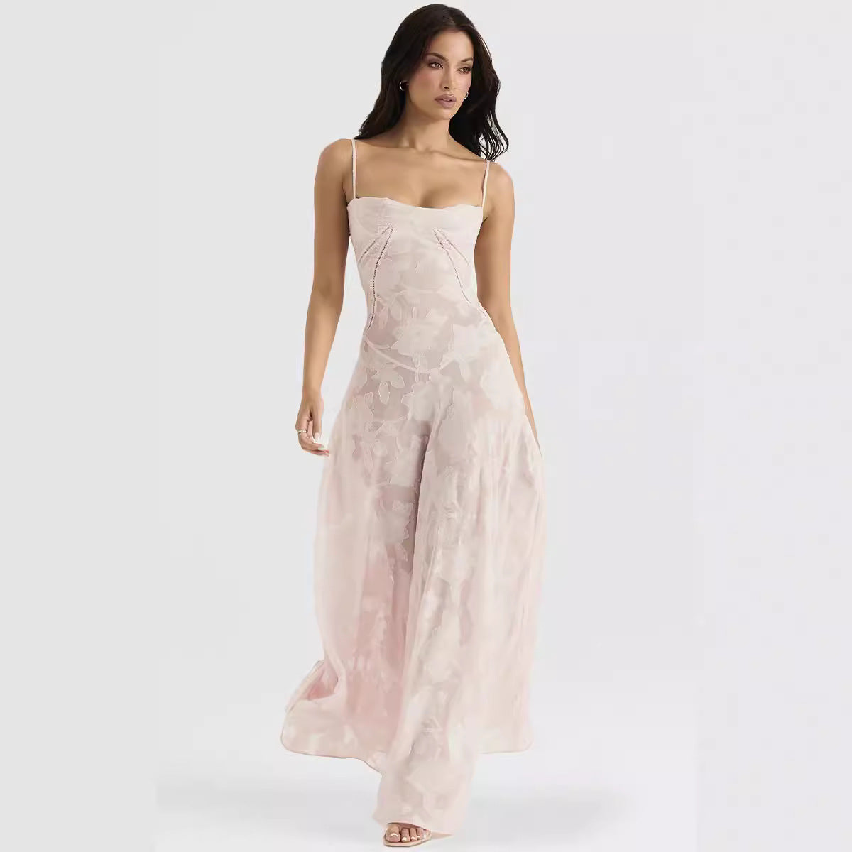 Elegant long dress by Montaracrest with flowing fabric and timeless design, perfect for special occasions.