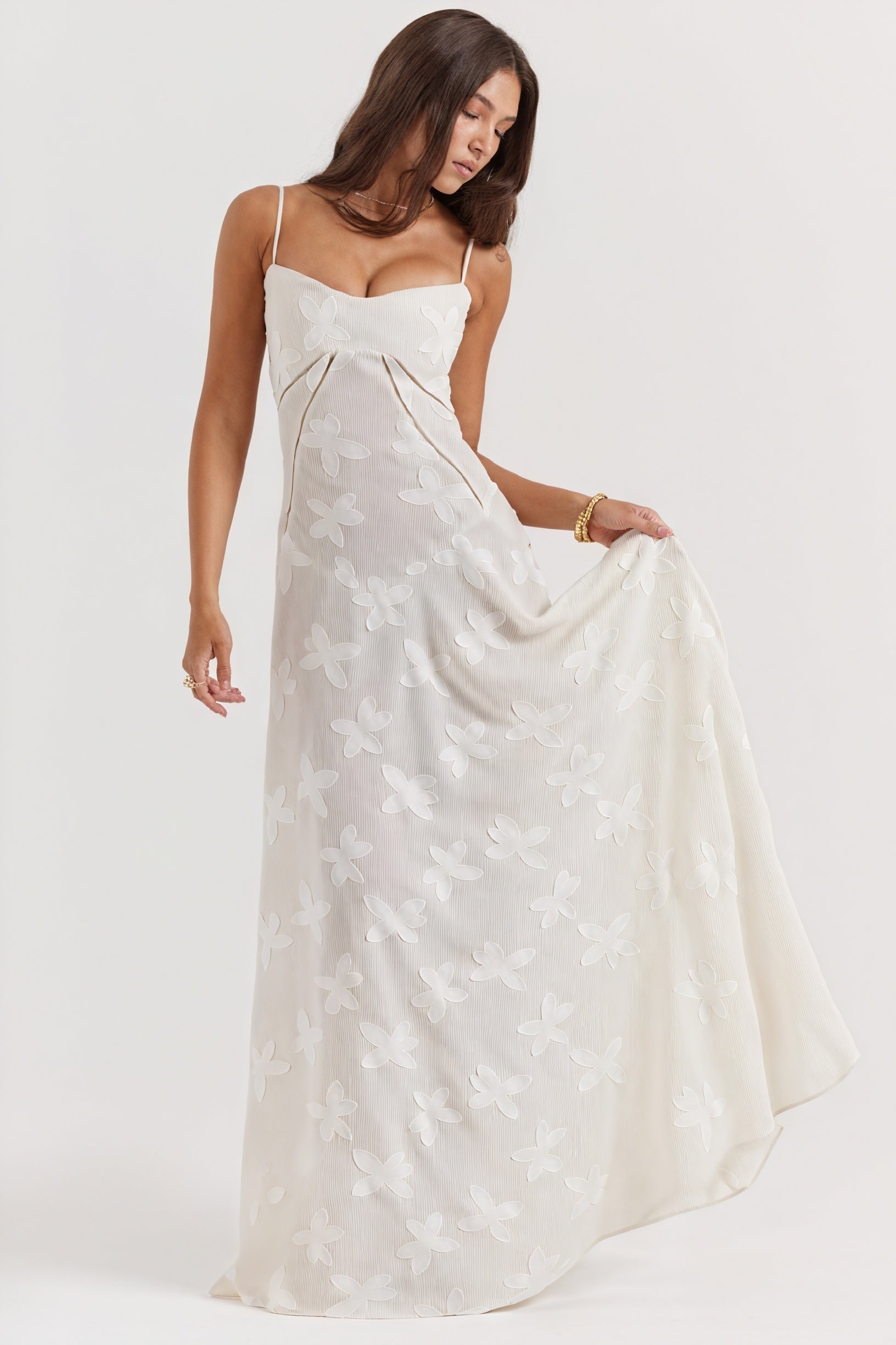 Elegant long evening dress by Montaracrest with intricate detailing, perfect for special occasions.