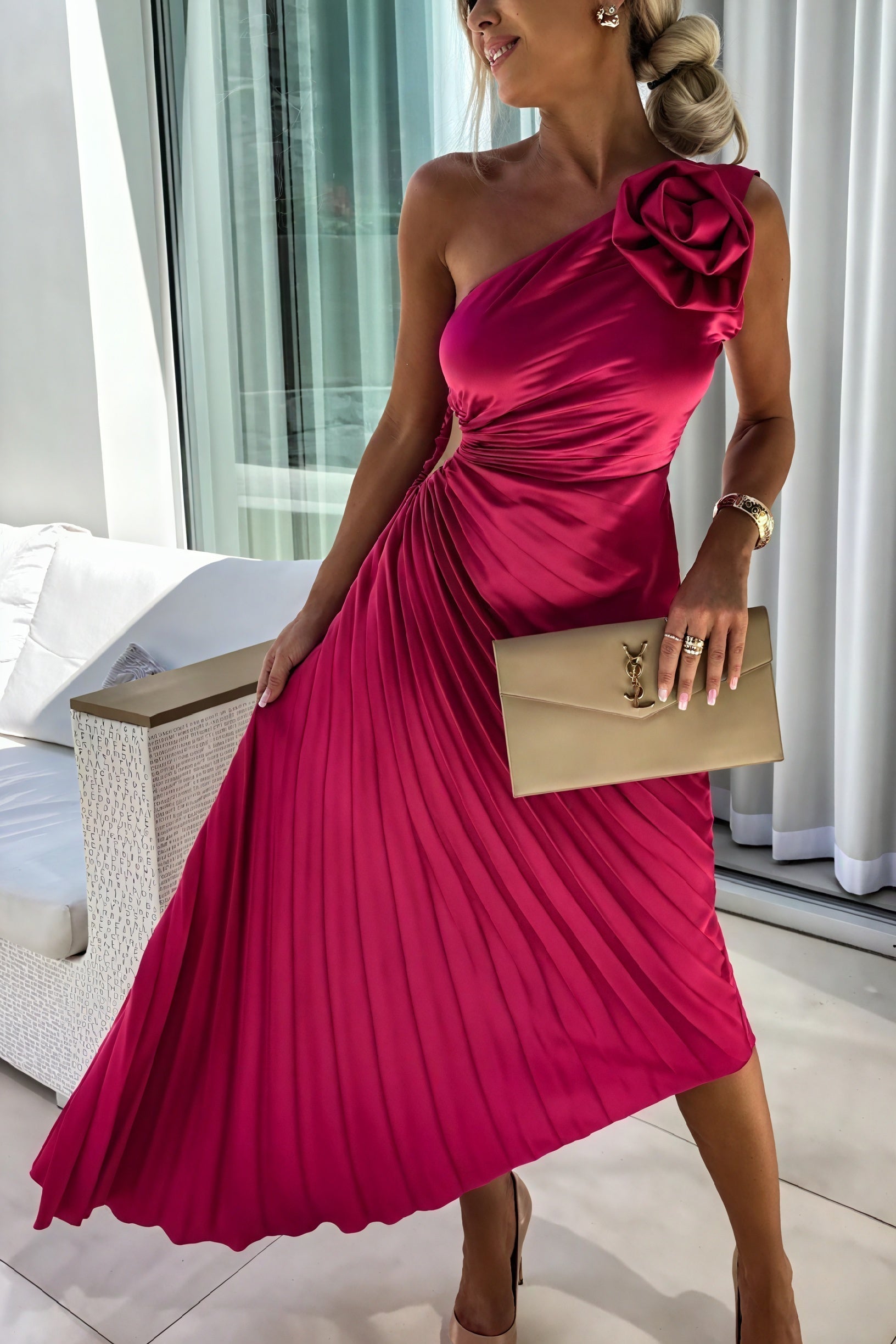 Montaracrest monospalla dress featuring elegant, timeless design with flowing fabric and sophisticated style for formal occasions.