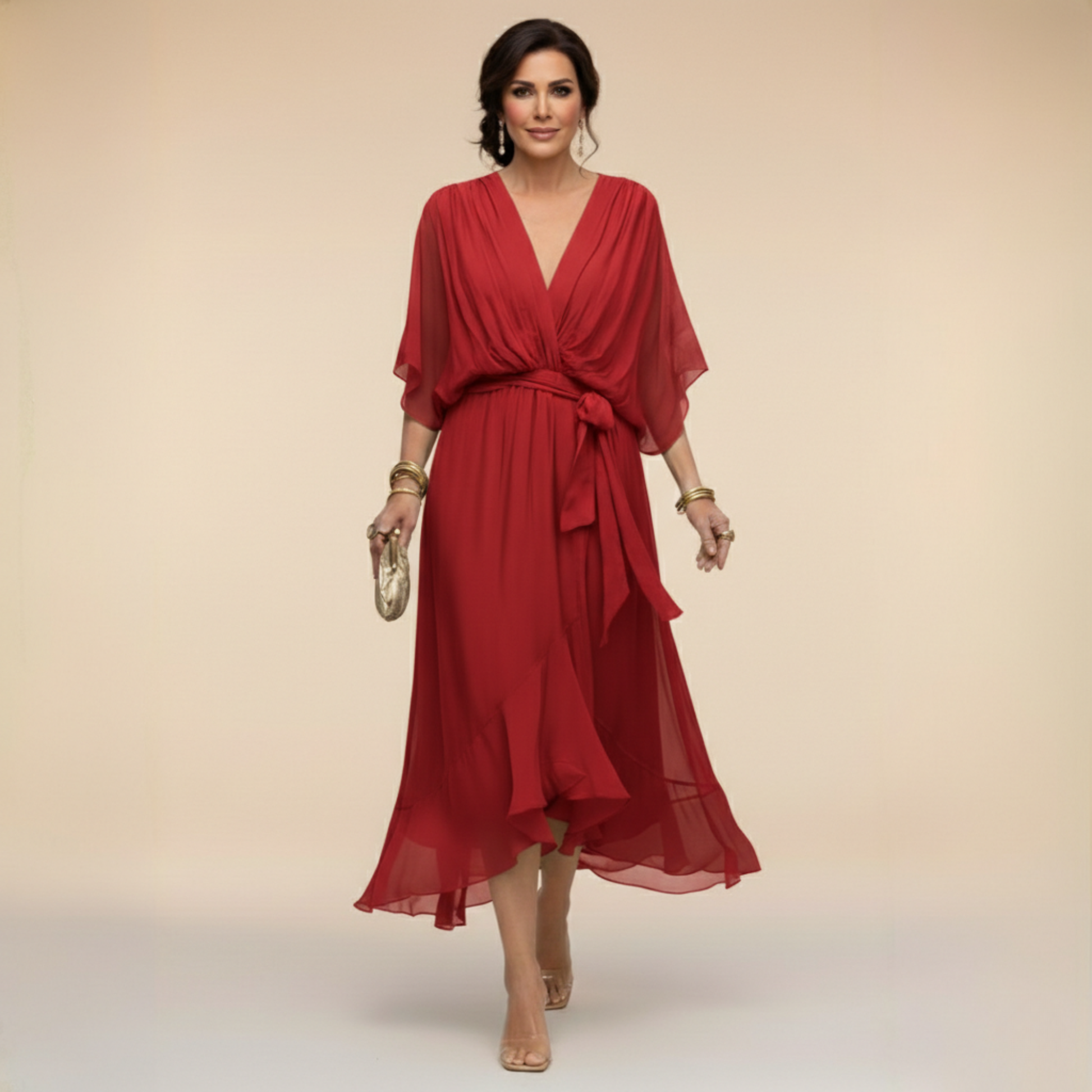 Montaracrest Monica chiffon dress with a V-neckline, flowing fabric, and an elegant sleeveless design, perfect for formal occasions.