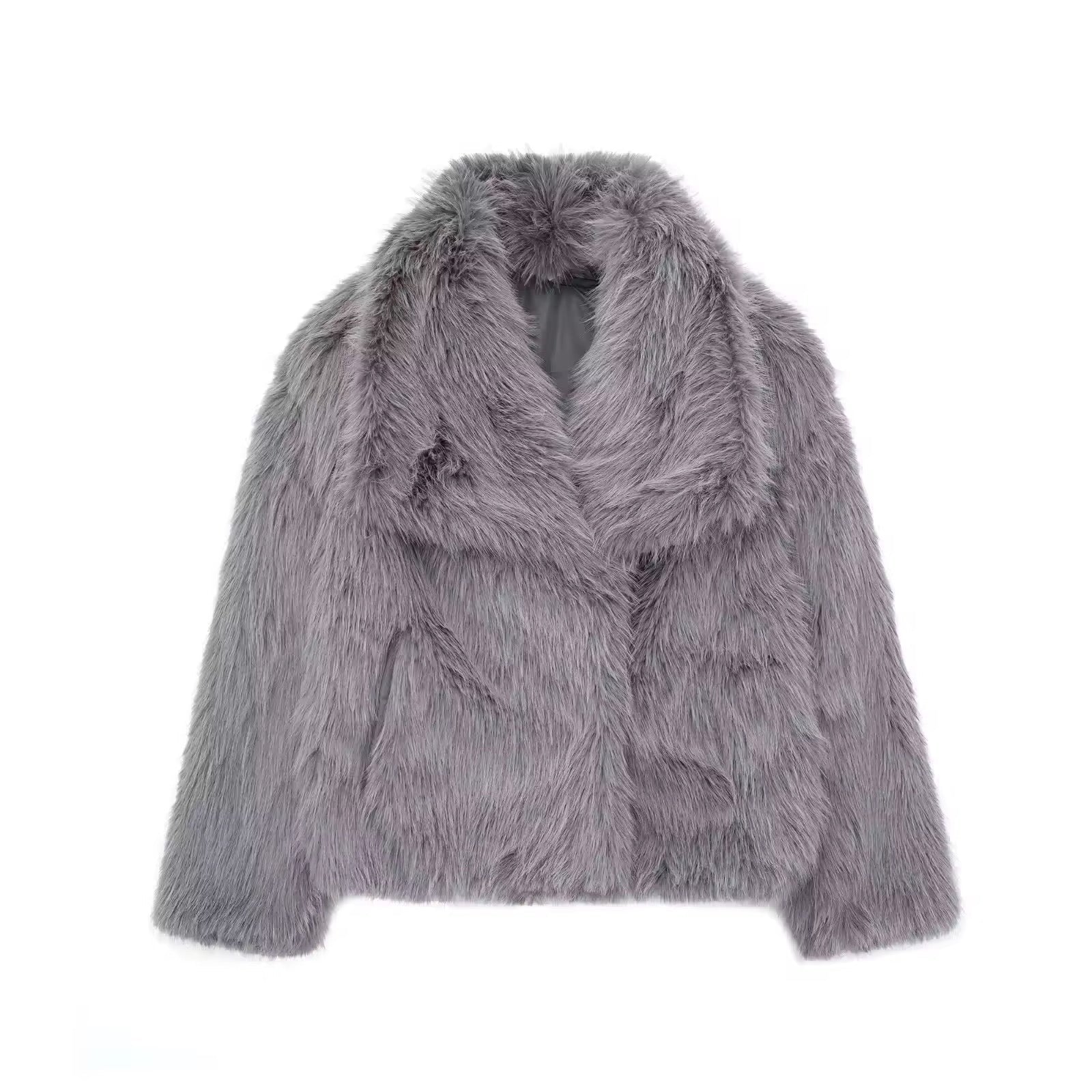 Montaracrest FIORA puffer jacket with faux fur effect, black quilted design, and high collar for warmth and style.