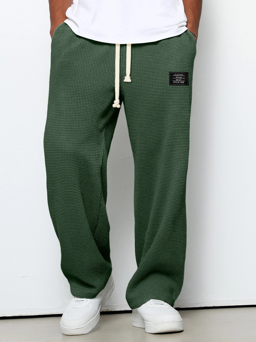 Montaracrest Lorenzo wide-leg pants with honeycomb textured fabric, featuring a relaxed fit and stylish design.