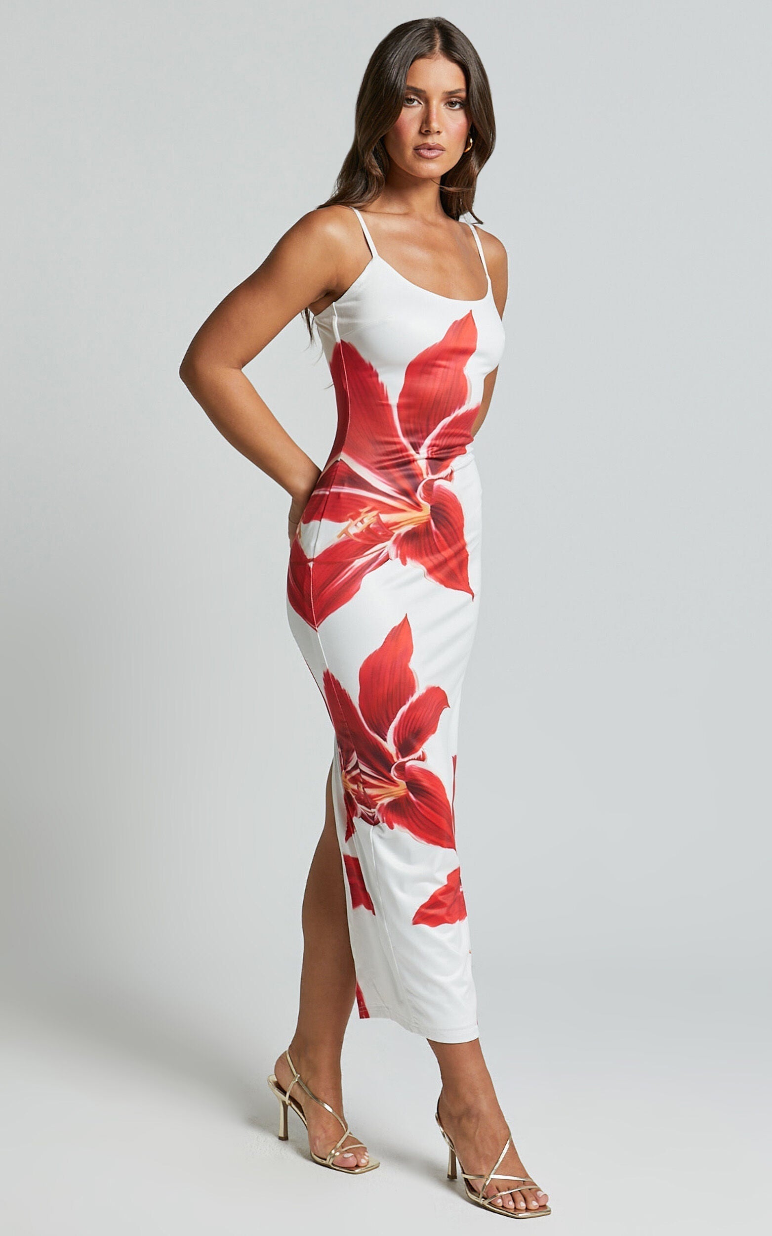 Montaracrest Lily Bloom dress displayed on a hanger, featuring floral patterns and lightweight fabric perfect for spring and summer wear.