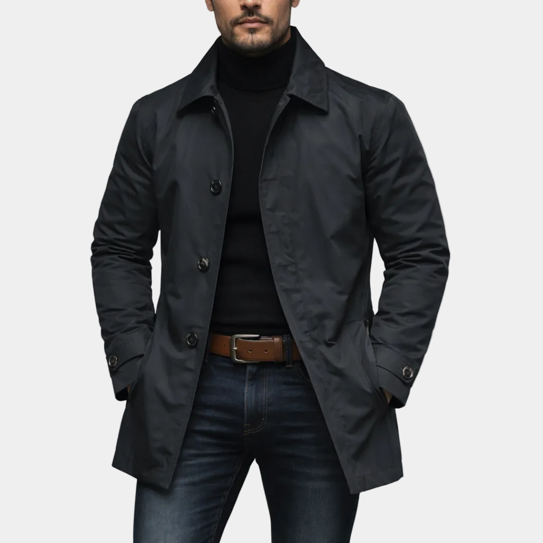 Alessandro™ Hareth waterproof coat by Montaracrest, shown in black with a hood and front zipper, suitable for rainy weather.