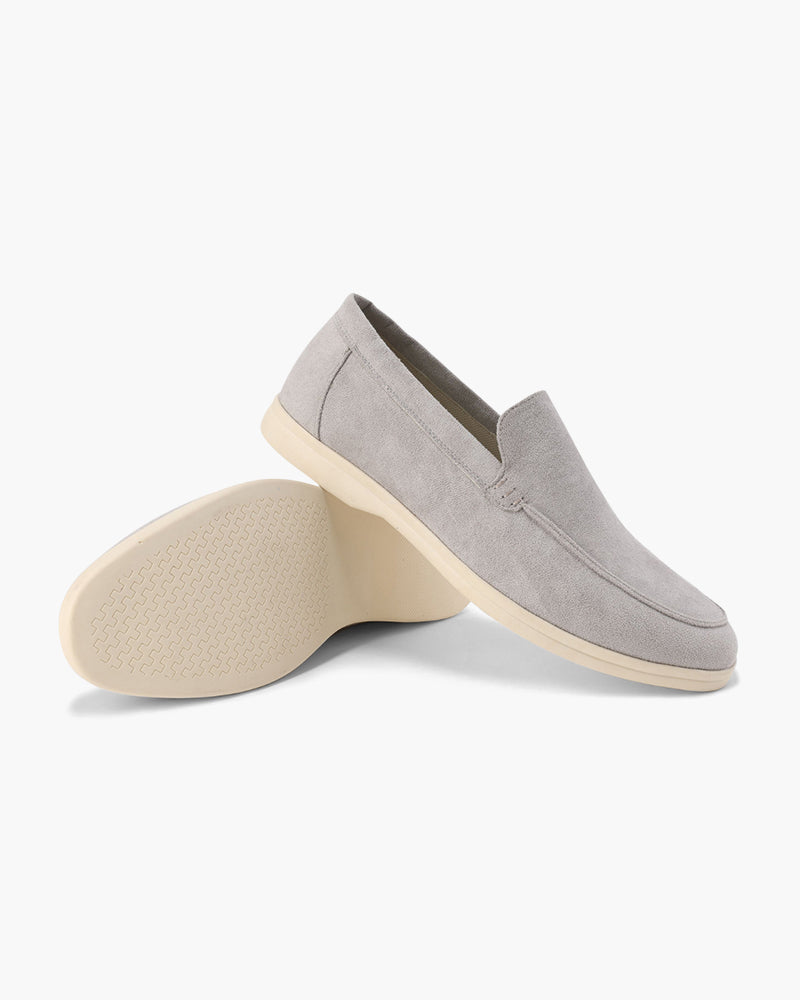 Orange suede moccasins in Villa Bellucci style by Montaracrest, featuring a classic loafer design with detailed stitching.